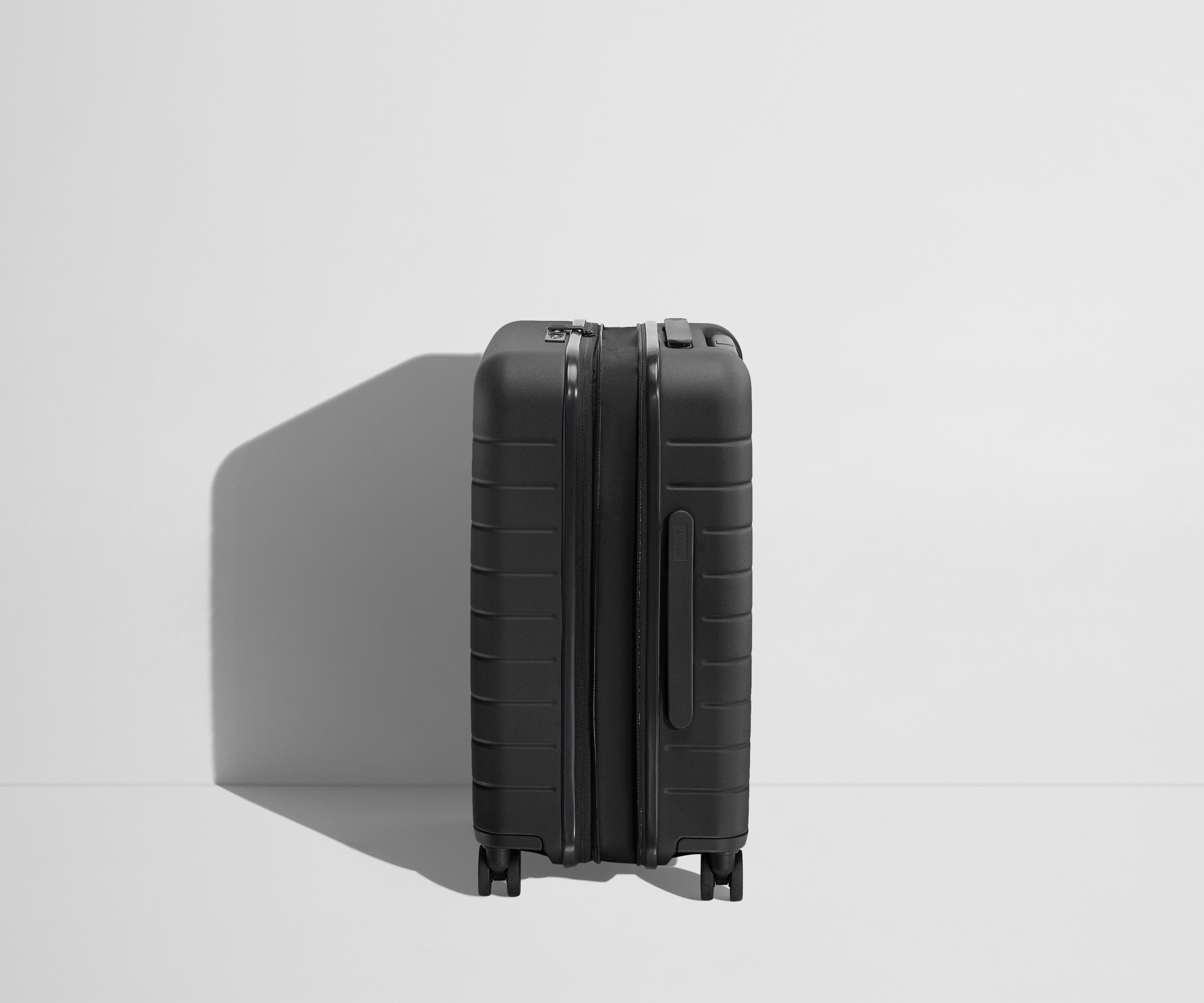 The Carry On Flex in Jet Black - Lightweight Expandable Luggage for Travel, Business & Weekend Getaways