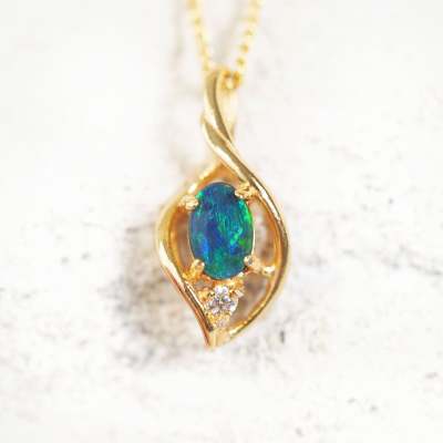 The Enchantment of the Alani Blue Triplet Opal Pendant