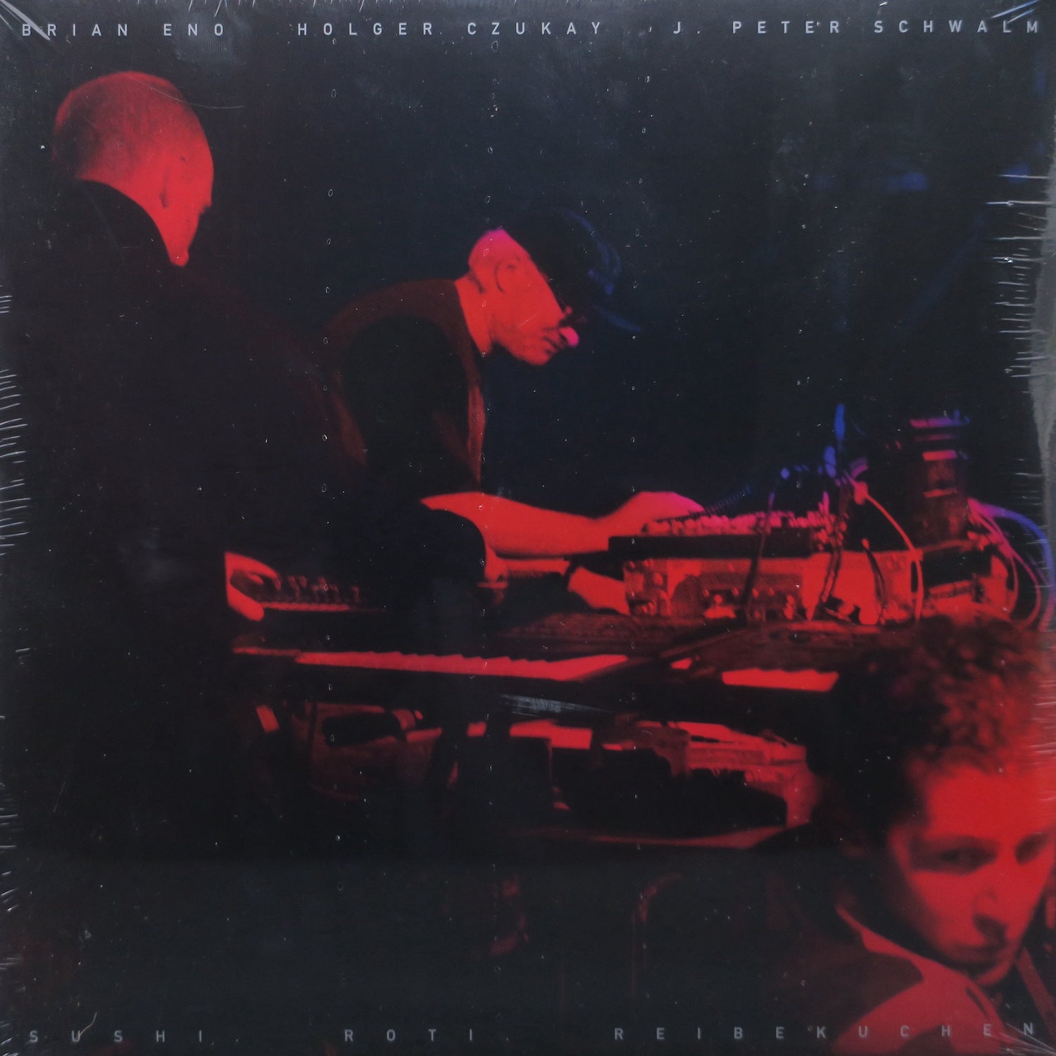 BRIAN ENO, HOLGER CZUKAY, J PETER SCHWALM 'Sushi. Roti. Reibekuchen' Vinyl LP - Limited Edition Collectors Record for Audiophiles & Music Enthusiasts - Perfect for Home Listening, DJ Sets & Vinyl Collections
