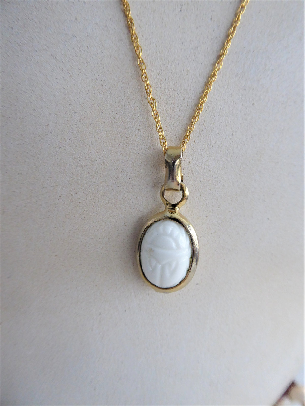 Egyptian Scarab Pendant Necklace - White Milk Glass & Gold Plated Chain - King Tut Inspired Jewelry - Perfect for Costume Parties, Historical Reenactments & Unique Gift Giving