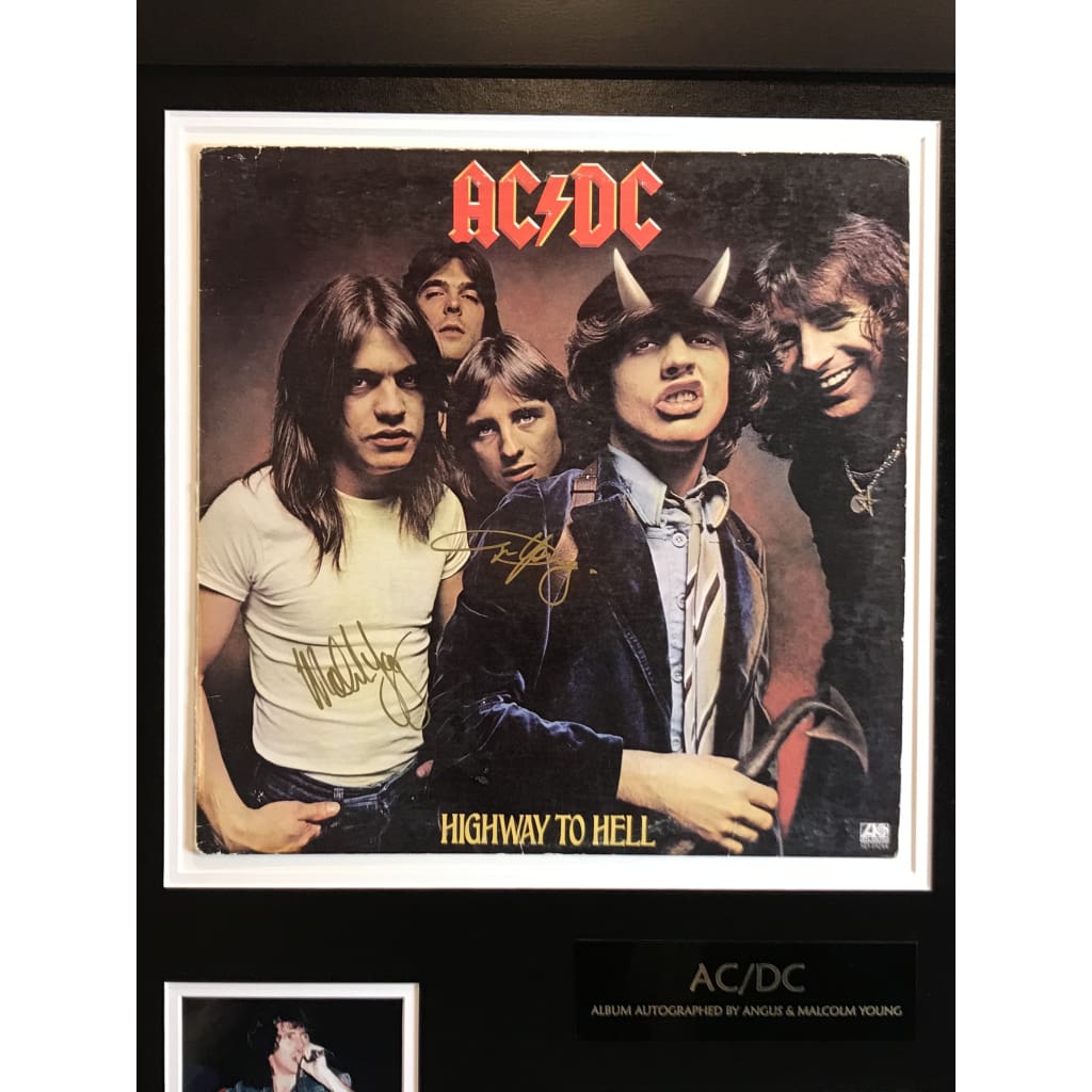 Authentic Signed AC/DC Album by Angus & Malcolm Young with JSA Certificate - Perfect for Rock Collectors & Music Memorabilia Displays