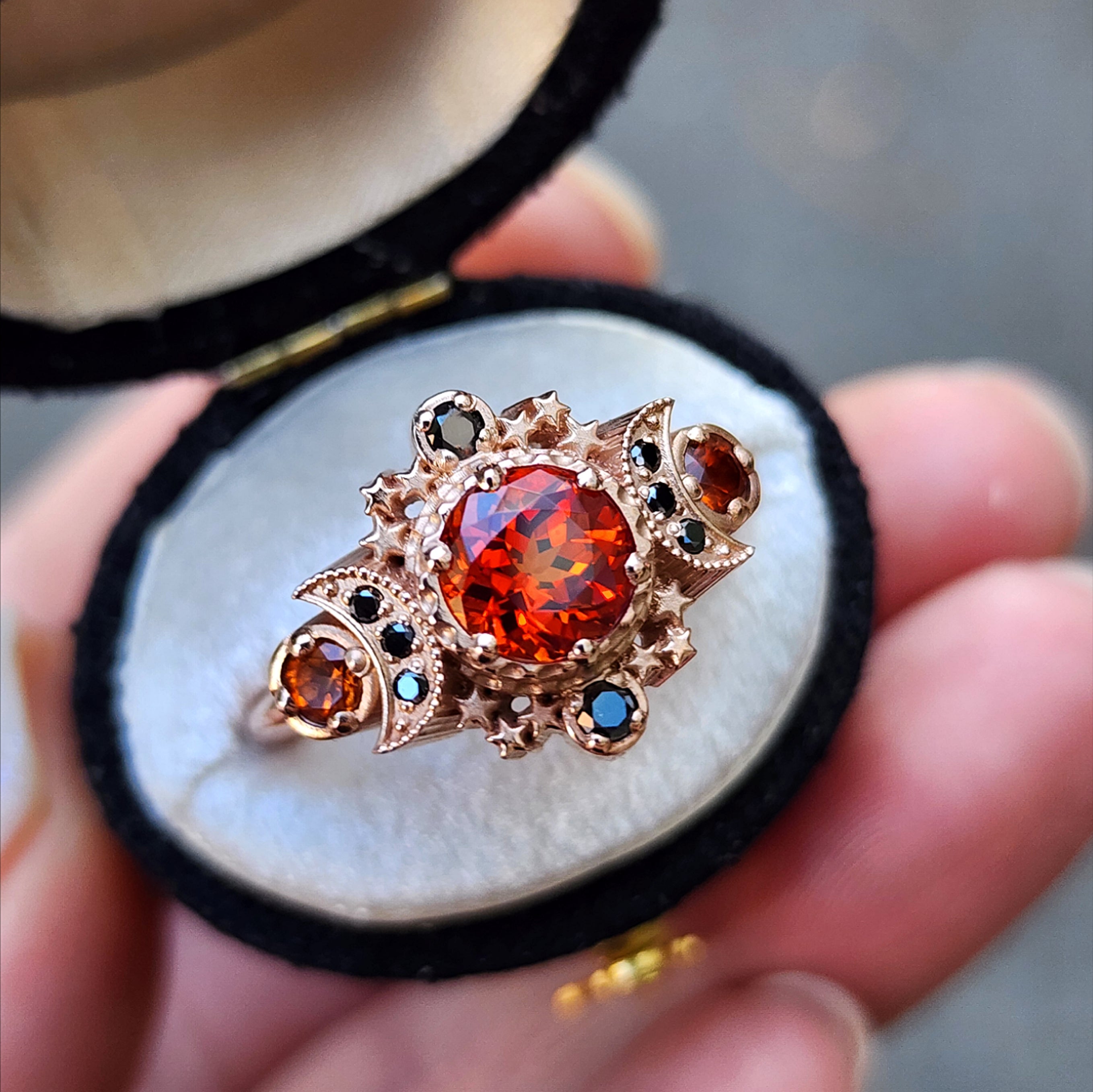 Pumpkin Queen Chatham Padparadscha Sapphire & Black Diamond Triple Moon Gothic Engagement Ring – Vintage Cosmos Fine Jewelry for Weddings, Proposals & Gothic Fashion