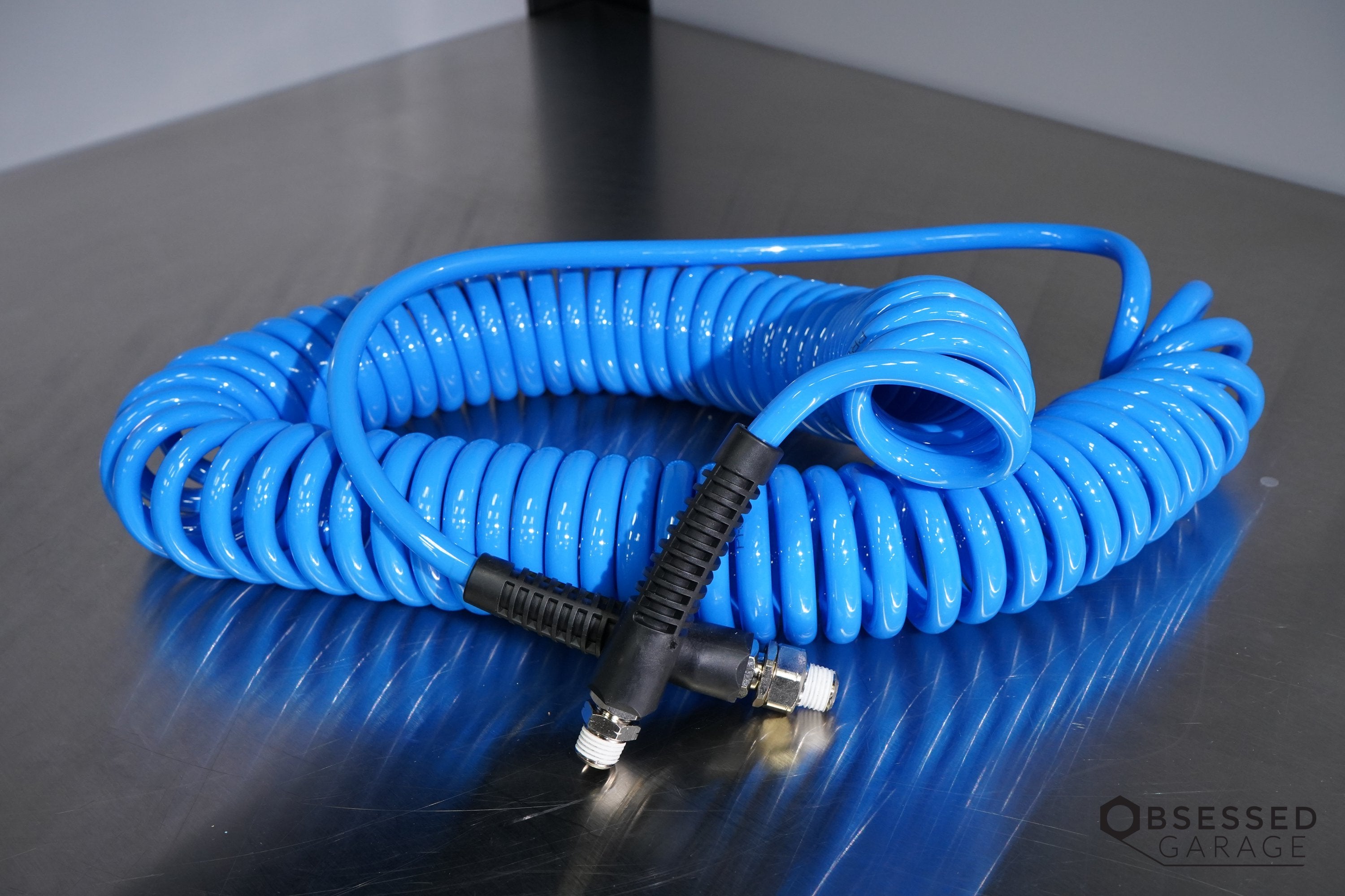 Prevost Spiral Hose with Fixed & Rotating 1/4