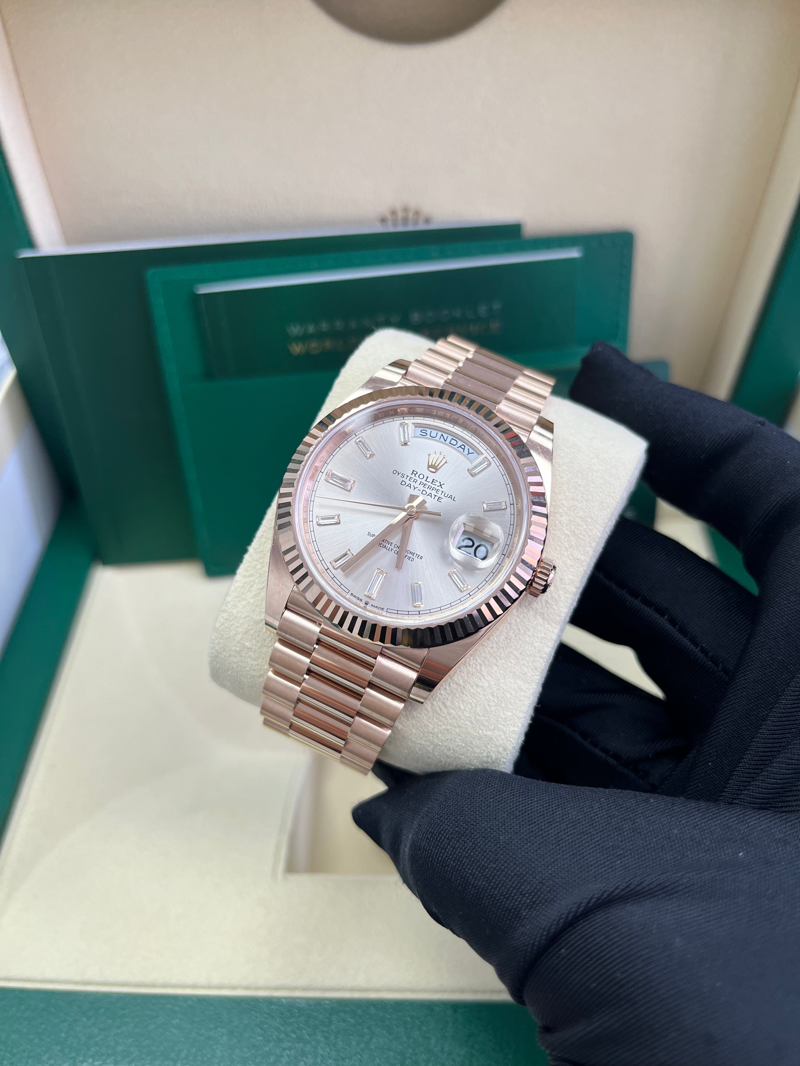 Rolex Day Date 40 Watch - 18K Yellow Gold, Fluted Bezel, Sundust Baguette Diamond Dial, President Bracelet 228235 | Luxury Dress Watch for Business & Formal Occasions