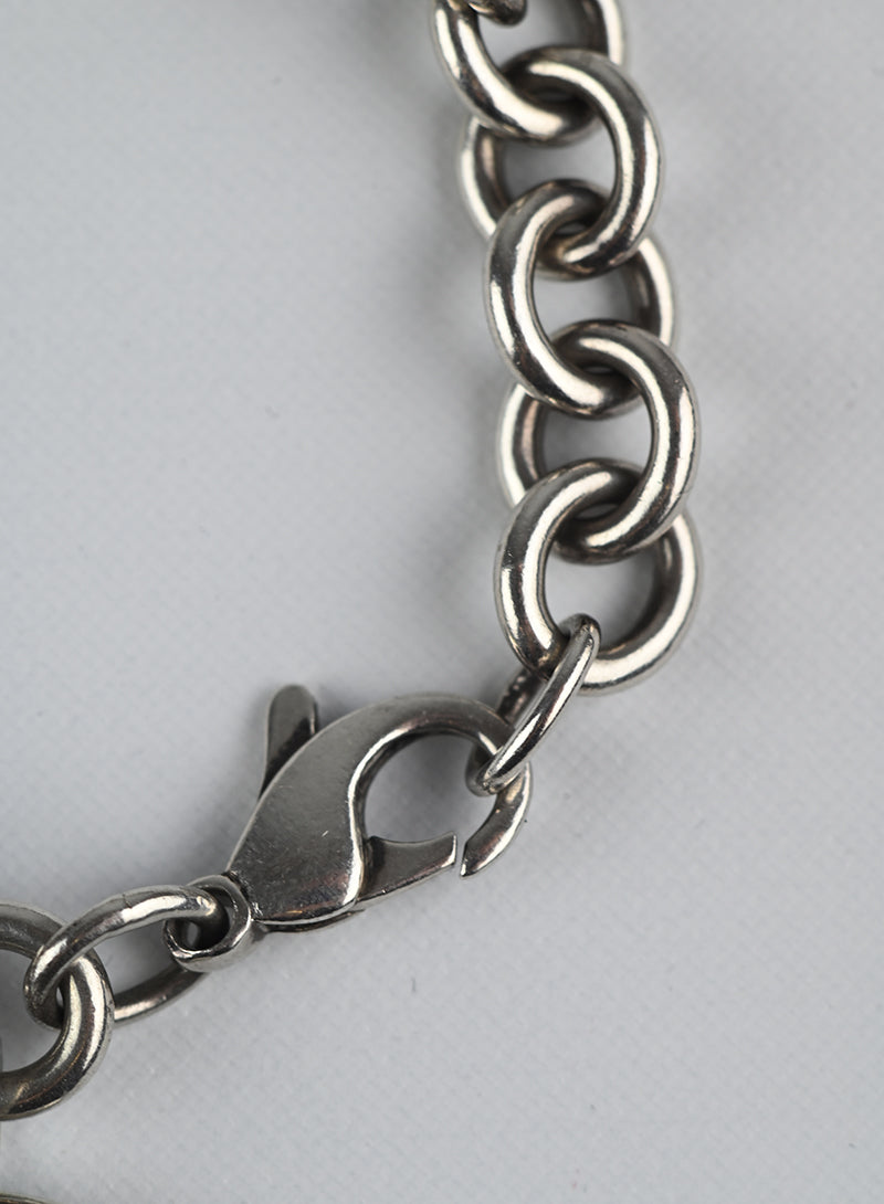 Tiffany & Co. Sterling Silver Bracelet with Round Charm - Elegant Jewelry Gift for Women, Perfect for Anniversaries & Special Occasions