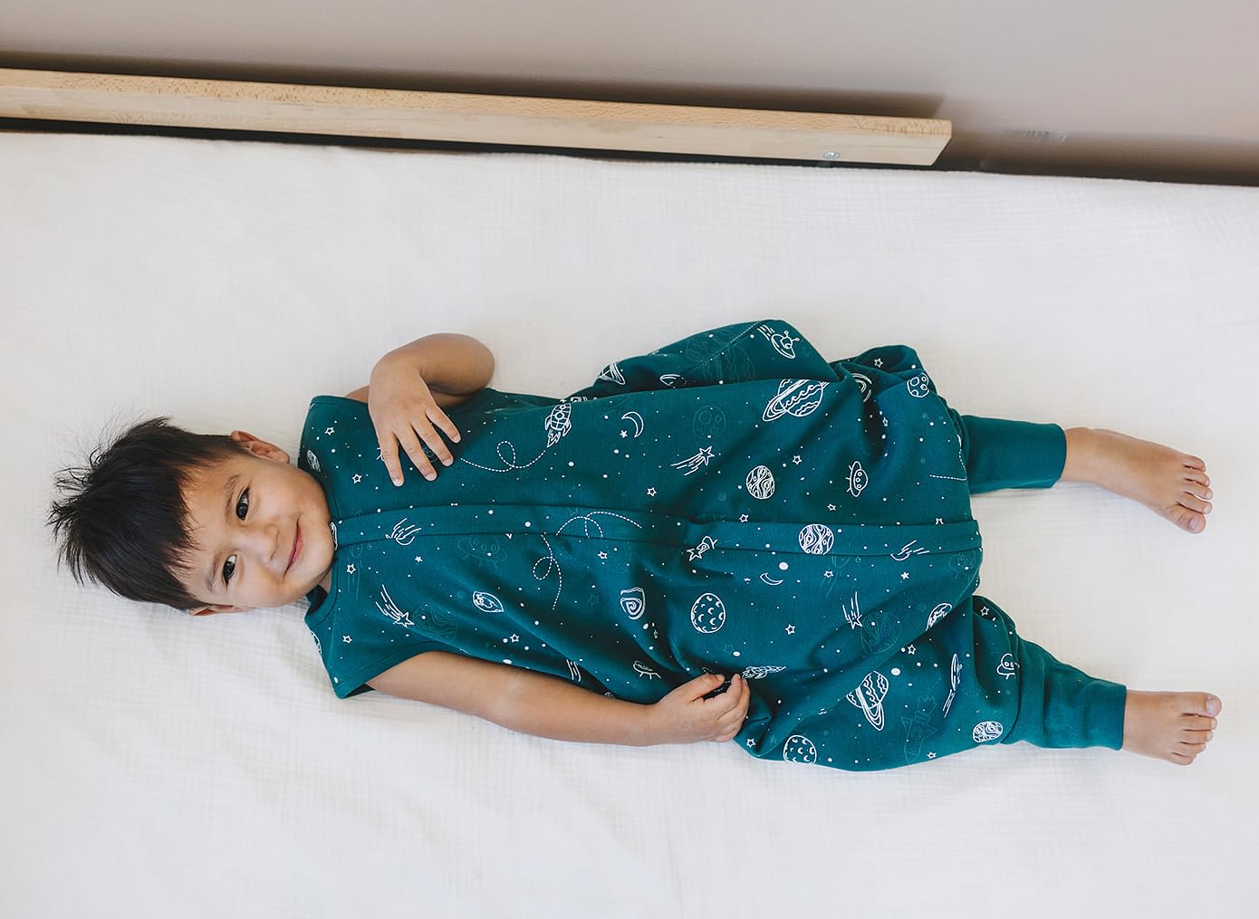 Woolino 4 Season Baby Sleep Sack with Feet - Australian Merino Wool & Organic Cotton - Toddler Sleeping Bag for 18-36 Months - Space Theme Glow in The Dark - Perfect for Nursery, Daycare & Travel
