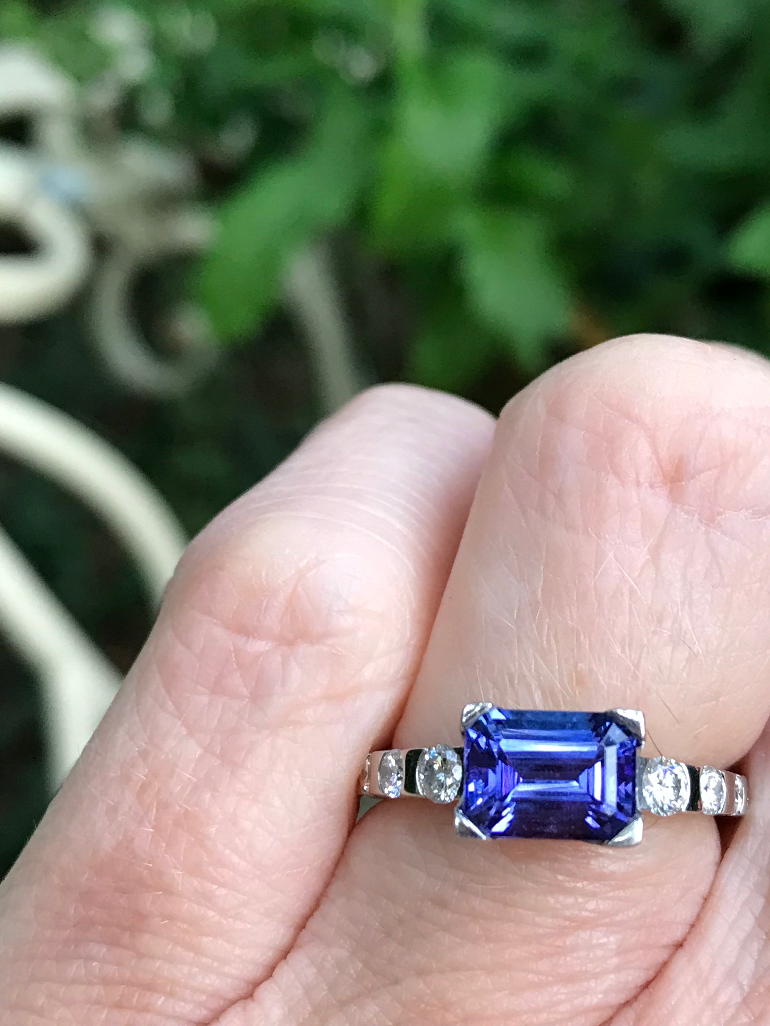 Exquisite Platinum Tanzanite Ring with Diamond Shoulders - Elegant Jewelry for Weddings, Anniversaries & Special Occasions