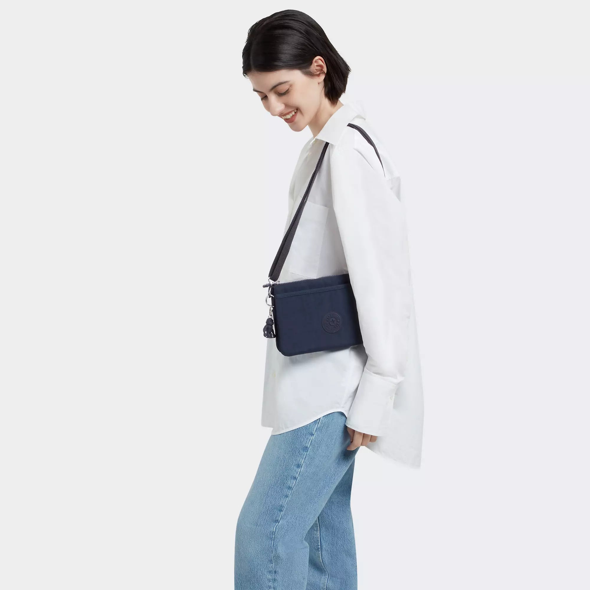 Kipling Riri Crossbody Bag - Light Blue Shoulder Purse for Women, Compact & Stylish, Perfect for Travel, Work & Everyday Use
