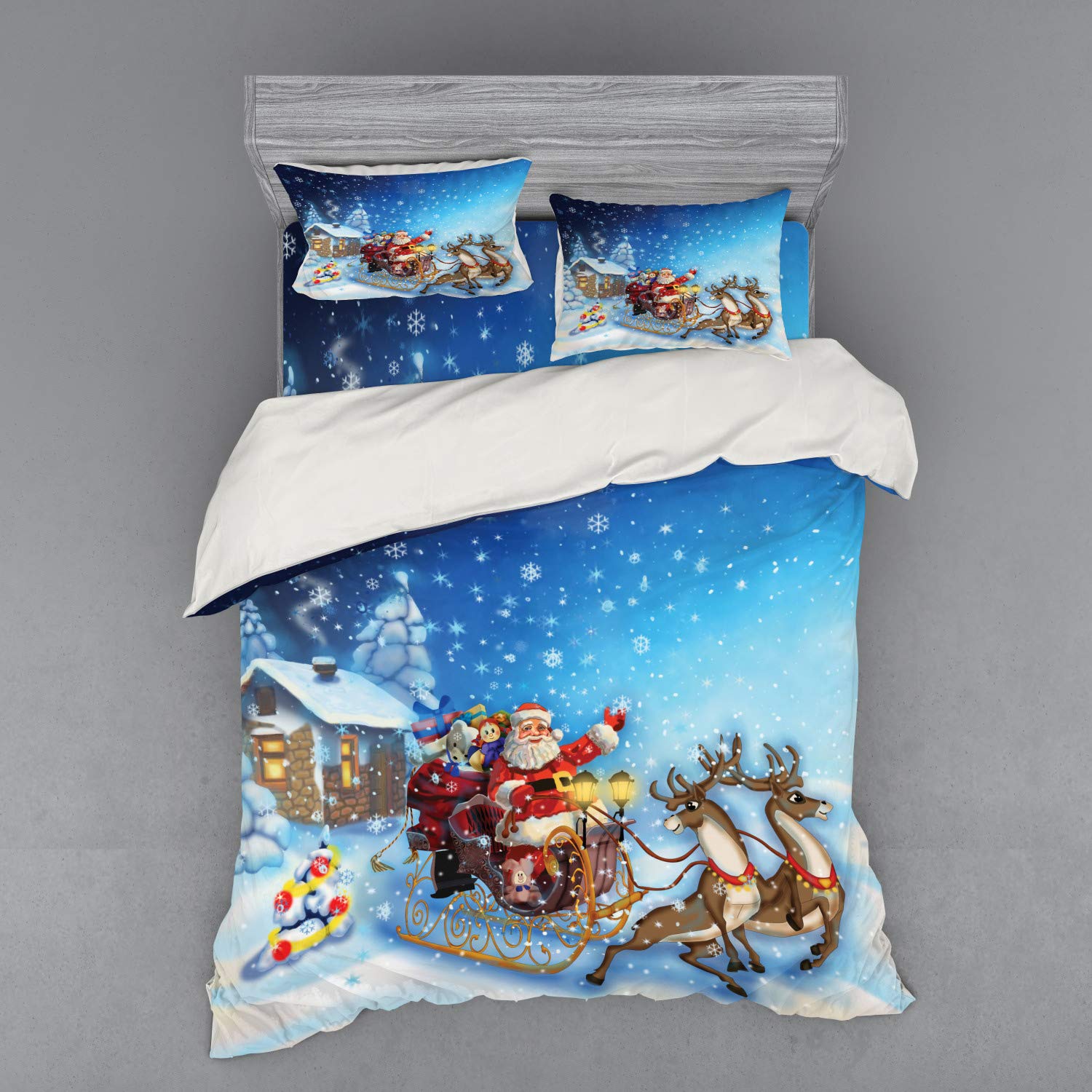 Ambesonne Christmas Duvet Cover Set - Santa in Sleigh with Reindeer & Toys, North Pole Fantasy Design, 4-Piece Bedding Set Includes Shams & Fitted Sheet, California King Size, Navy Blue - Perfect for Holiday Bedroom Decor & Winter Themed Guest Rooms