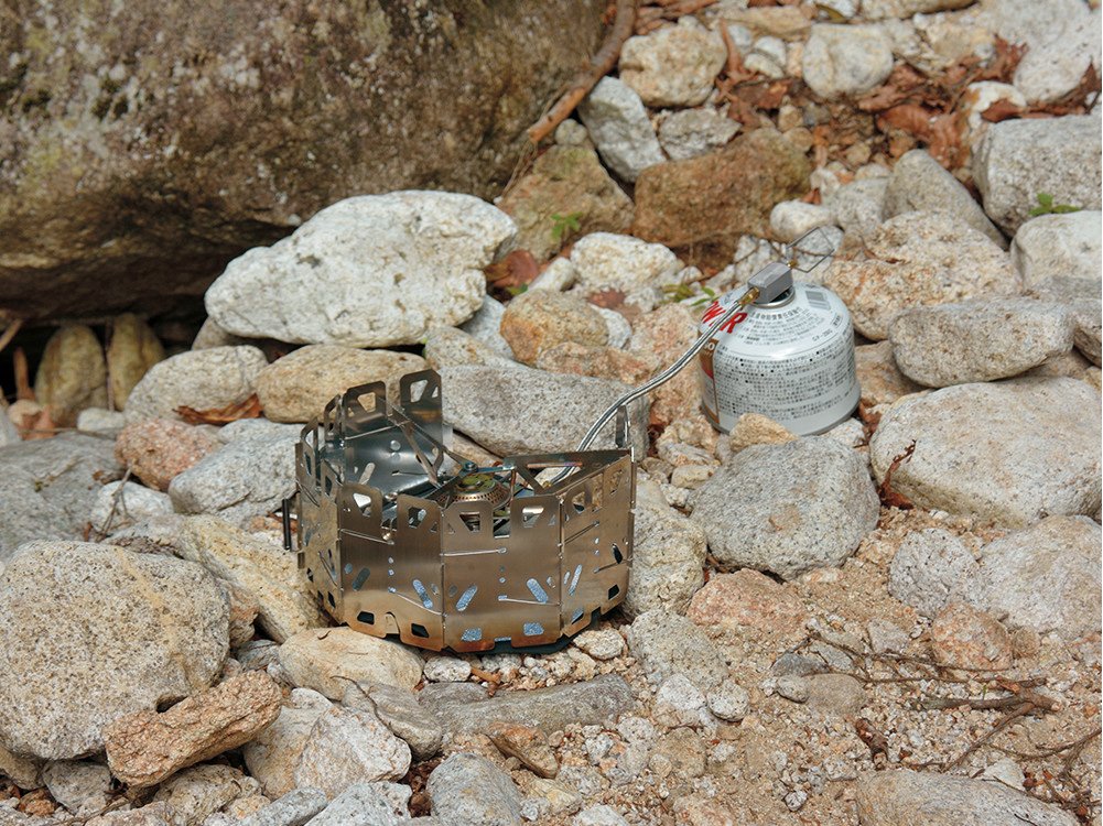 Snow Peak GeoShield Camping Stove - Compact Portable Gas Burner for Backpacking, Hiking & Outdoor Cooking | Perfect for Camping Trips, Picnics & Emergency Preparedness