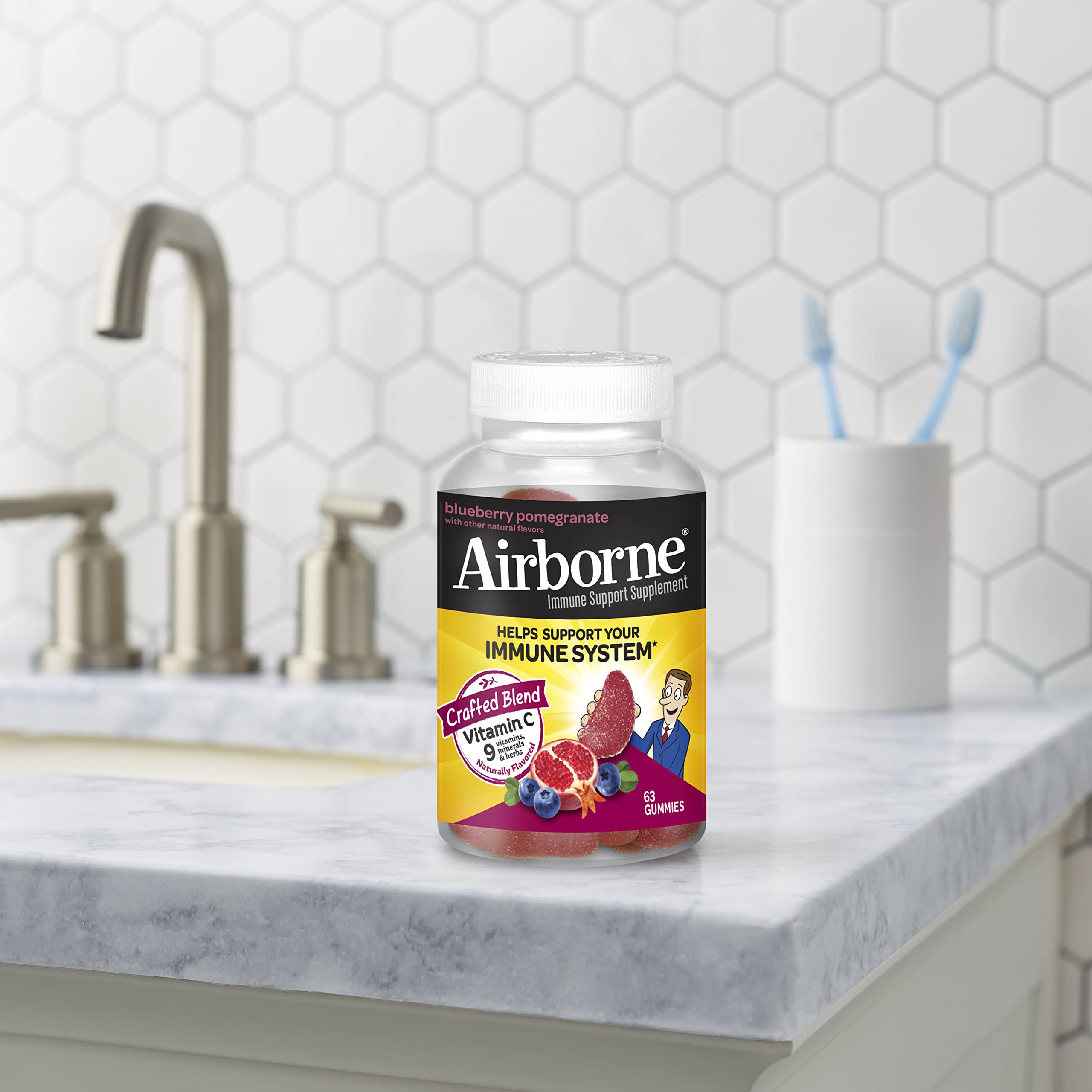 Airborne 750mg Vitamin C Gummies for Adults - Immune Support Supplement with Antioxidants Vitamins A, C & E - 63 Count Blueberry Pomegranate Flavor Gummy Vitamins - Boost Immunity & Energy for Workouts, Travel & Daily Wellness