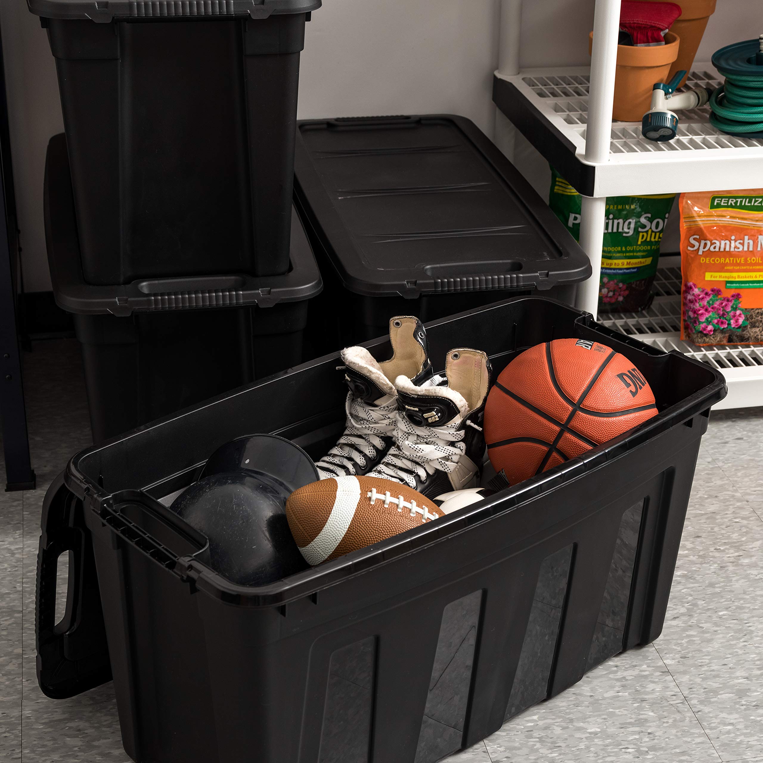 31 Gallon Heavy Duty Storage Totes with Easy-Grip Handles - 4 Pack Stackable Utility Bins with Lids | Durable Garage Organization Containers | Made in USA (Black) | Perfect for Home, Office & Warehouse Storage Solutions