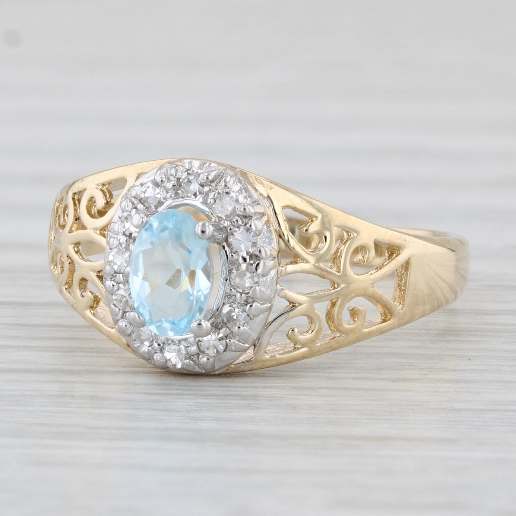 0.58ctw Oval Blue Topaz Diamond Halo Ring 14k Yellow Gold Size 7.5 - Elegant Openwork Design for Engagement, Anniversary & Special Occasion Gifts