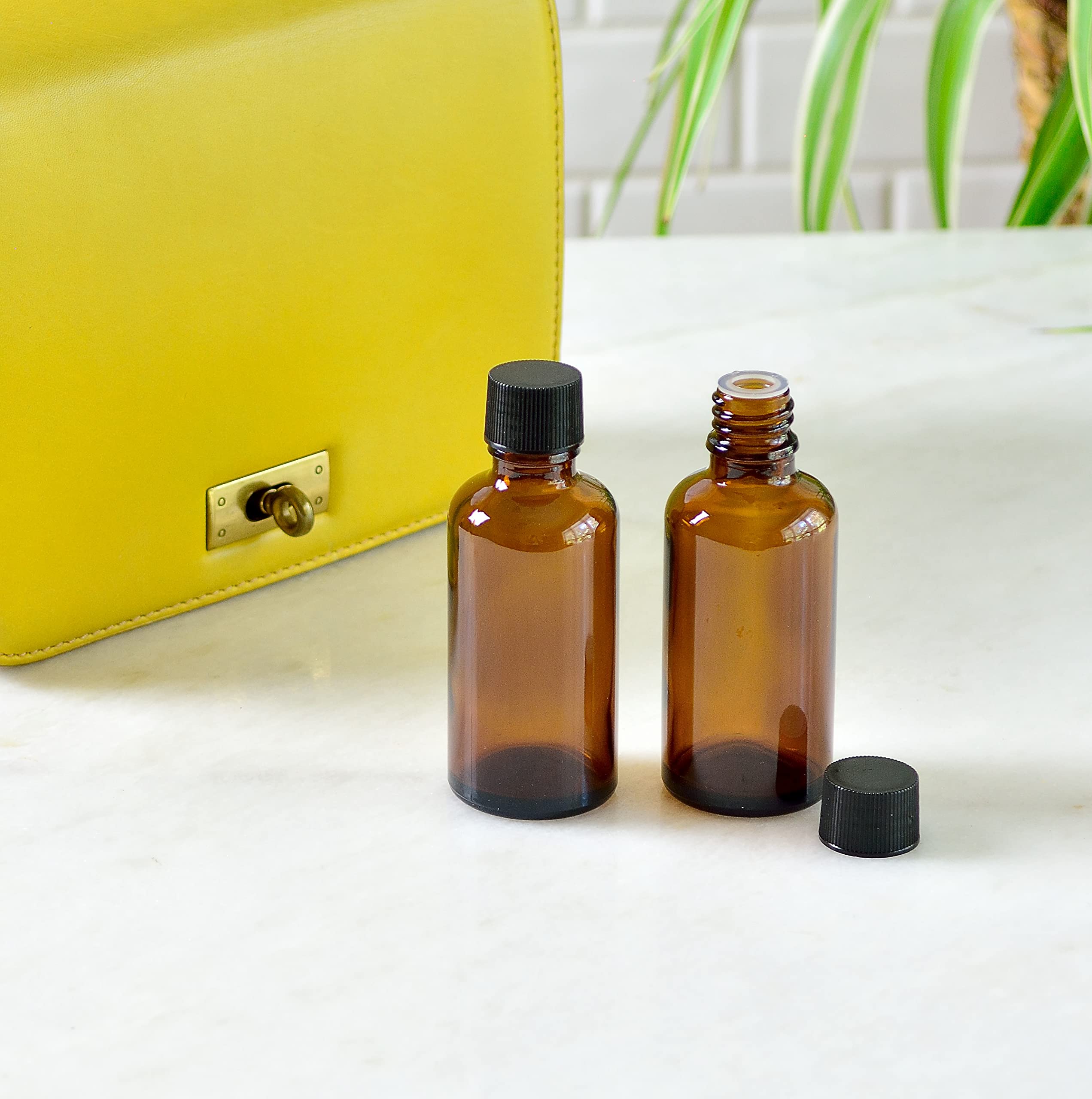 Youngever 16 Pack 2oz Amber Glass Bottles with Lids - Refillable Essential Oil Containers for Vanilla Extract, DIY Beauty & Aromatherapy - Perfect for Home, Spa & Gift Packaging