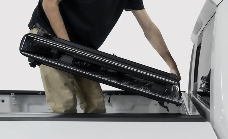 LOMAX Tri-Fold Truck Bed Cover | Black Urethane Finish | Fits 22+ Toyota Tundra 5.6ft Bed | Durable Weather Protection for Pickup Trucks | Perfect for Camping, Hauling & Outdoor Adventures