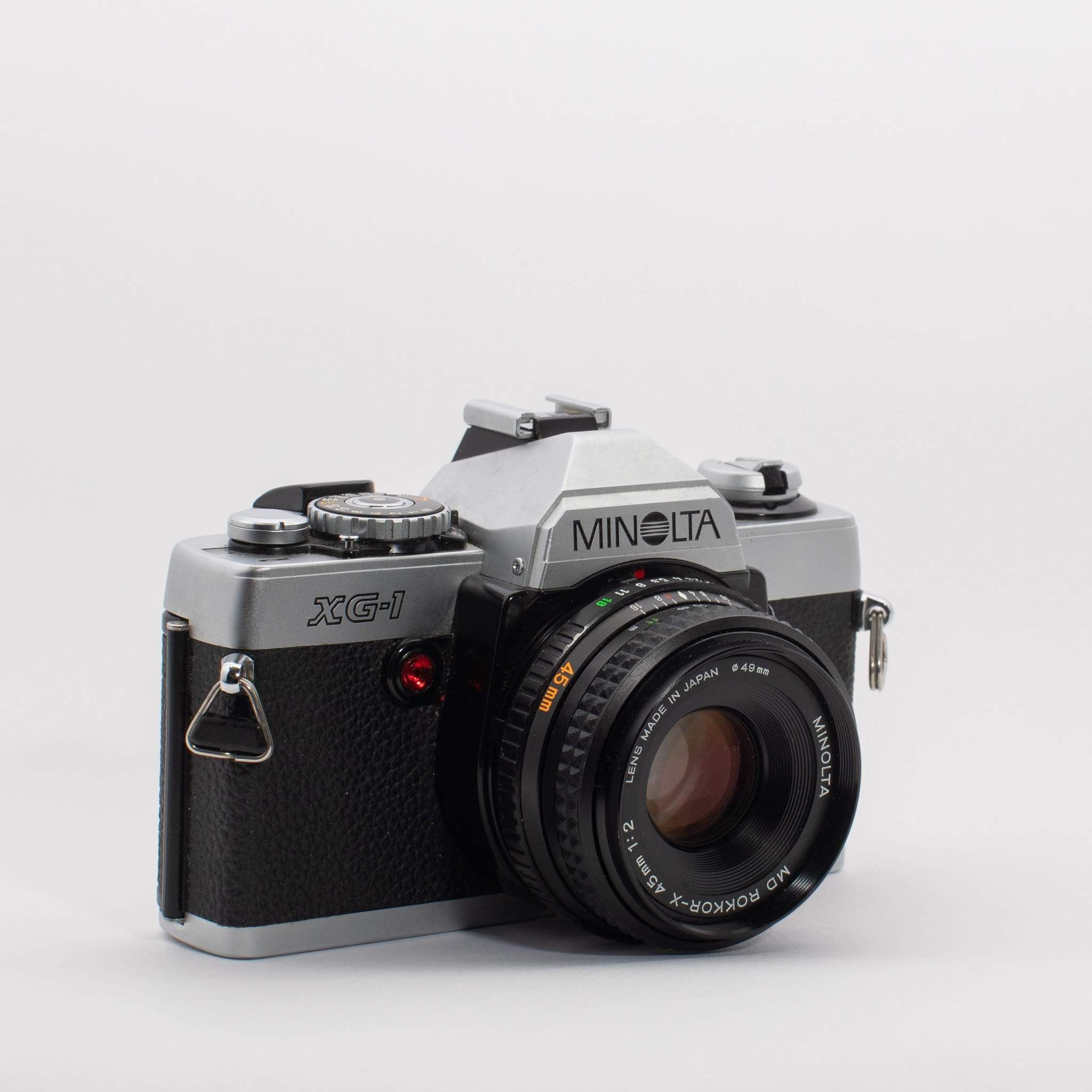 Vintage Minolta XG1 35mm Film SLR Camera with 45mm f/2 Lens - Classic Photography, Film Enthusiasts, Retro Shooting Experience