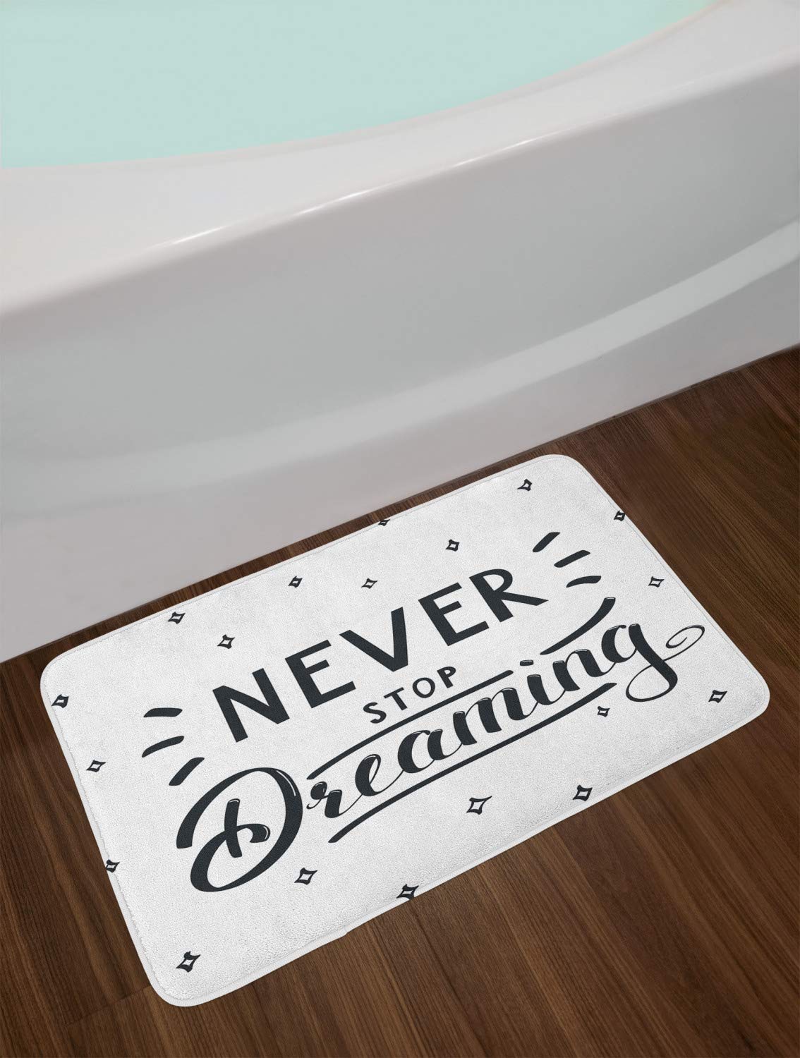 Ambesonne Inspirational Bath Mat - 'Never Stop Dreaming' Cursive Script, Non-Slip Plush Bathroom Rug, 30.2x20 Inches, Dark Night Blue & White - Perfect for Modern Home Decor & Spa-Like Bathroom Experience