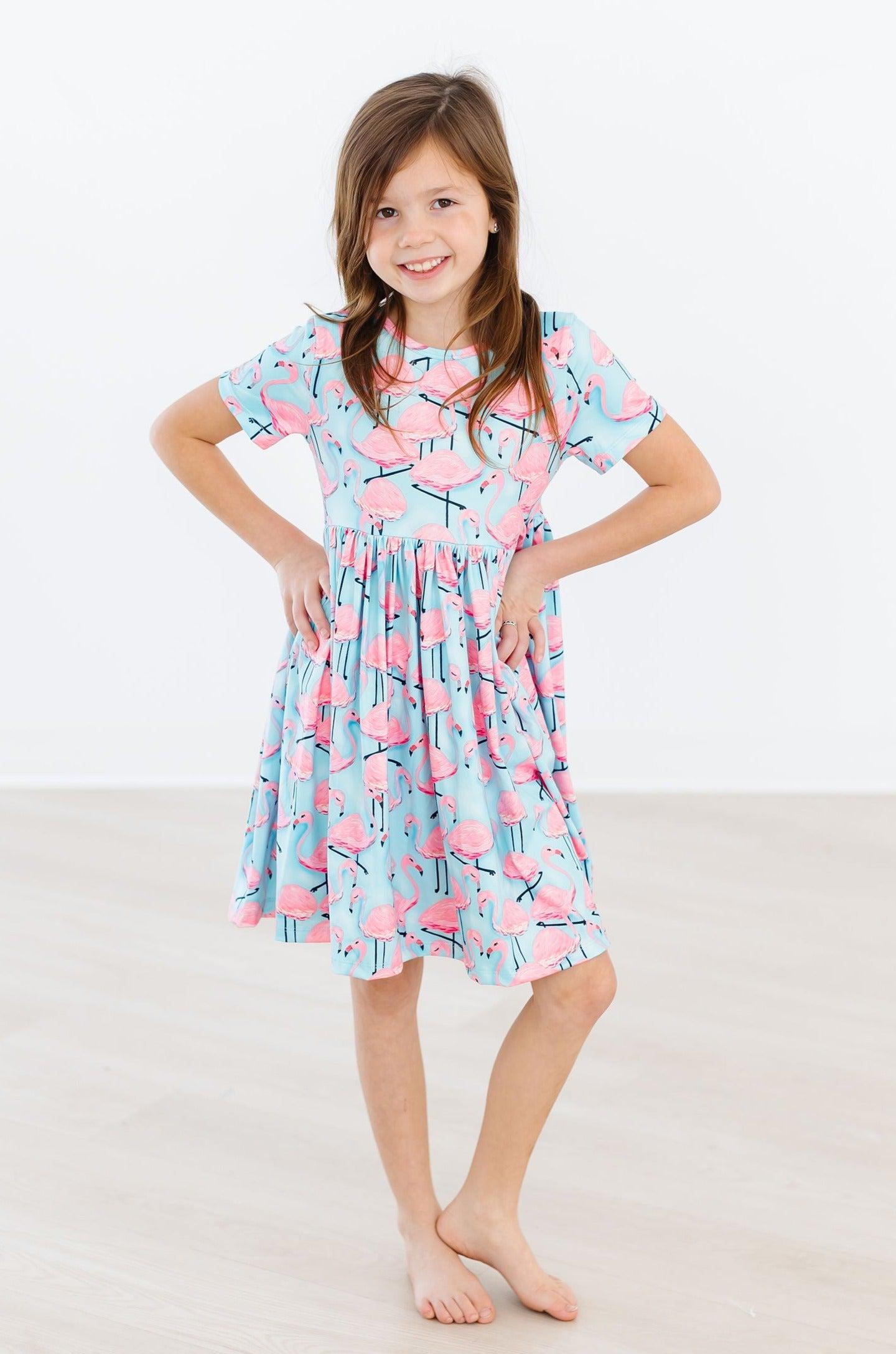 Stylish Pink Flamingo Short Sleeve Pocket Twirl Dress for Women - Perfect for Summer Parties, Beach Vacations & Casual Outings