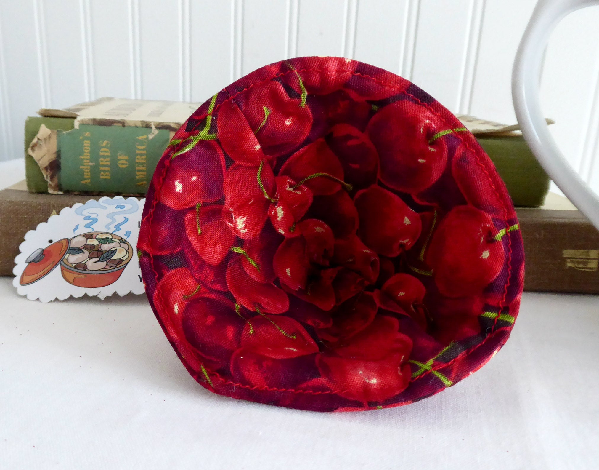 Red Cherries Knob Holder - Teapot Lid Holder with Soft Padded Interior & Exterior - Perfect for Kitchen, Tea Parties, and Gift Giving