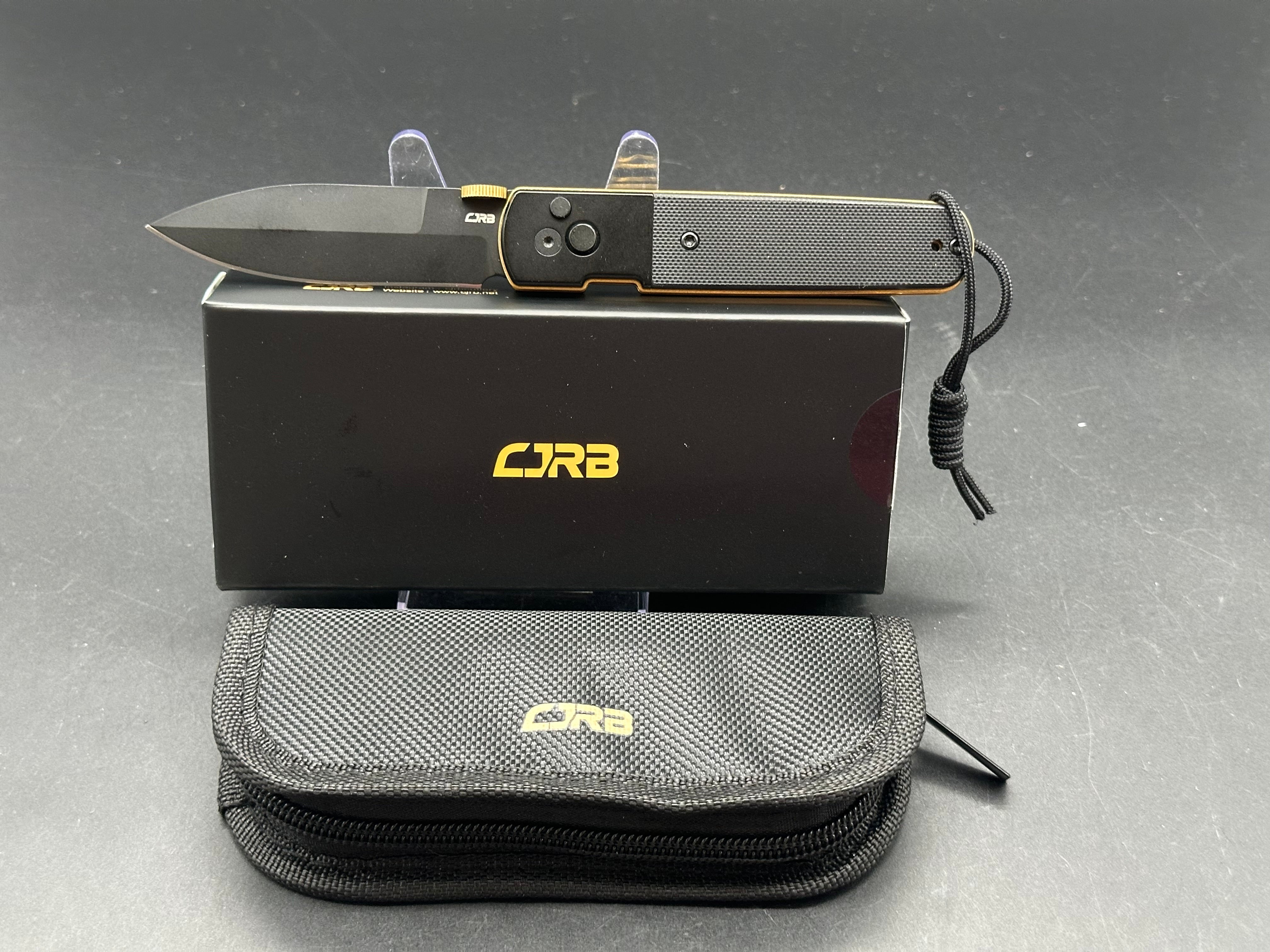 CJRB LOCUST Folding Knife - Black PVD Coated AR-RPM9 Steel Blade, G10 Handle, Spear Point Design for Outdoor, Camping & EDC Use