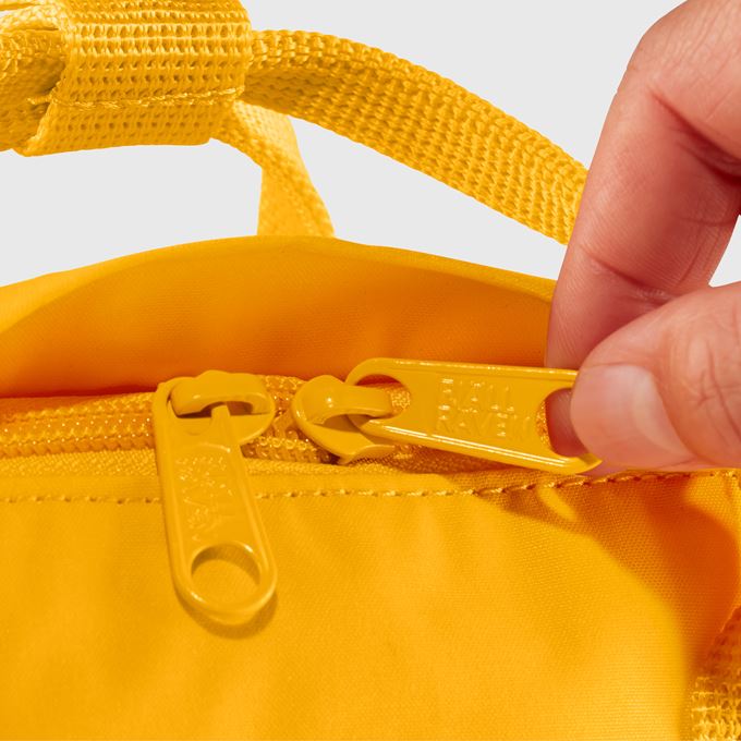 Fjallraven Kanken Mini Backpack - Lightweight Waterproof Daypack for Women & Men, Perfect for School, Travel & Outdoor Adventures | Kantarell Color