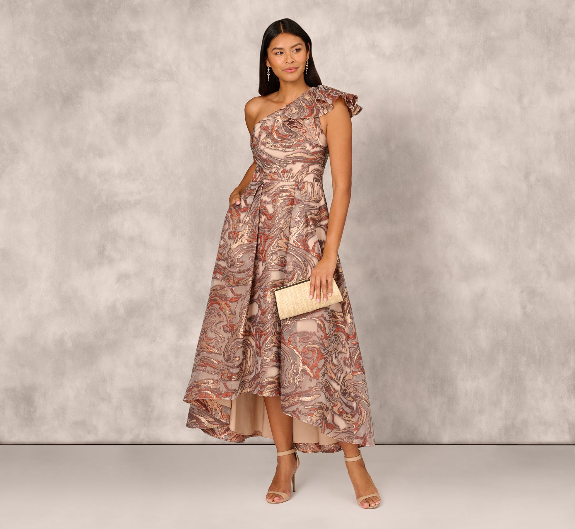Elegant Rust Multi-Color Jacquard High-Low Gown with Ruffle One-Shoulder Neckline – Perfect for Evening Parties, Weddings & Special Occasions
