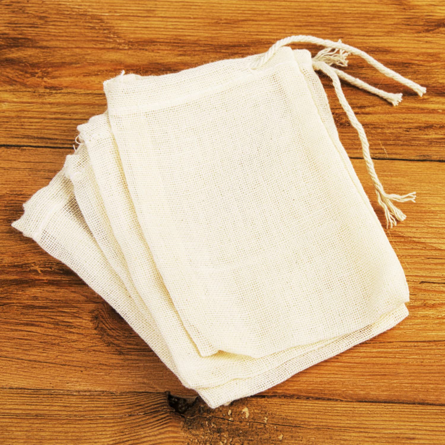 **Hopttreely 50PCS Natural Unbleached Muslin Drawstring Bags (3x4 Inch) - Organic Cotton Spice Bags for Tea, Coffee, Herbs, Soup & Broth - Reusable Cheesecloth Filter Bags for Cooking, Brewing & DIY Crafts**