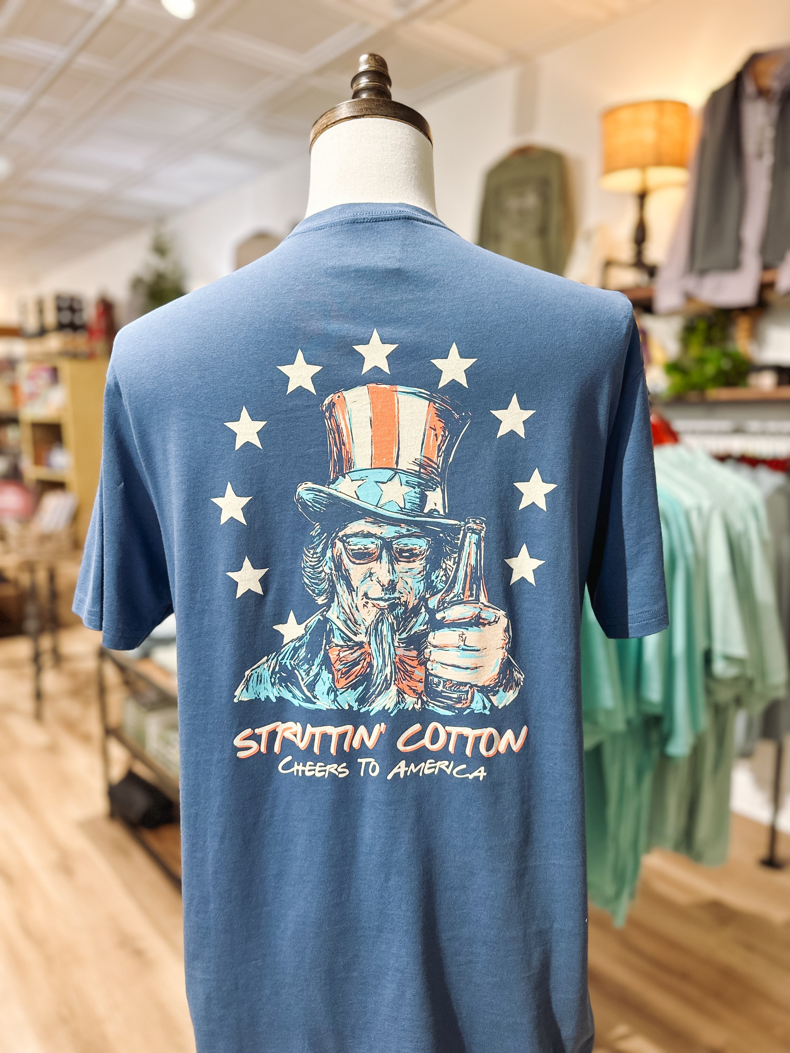 Struttin’ Cotton Cheers to America T-Shirt - Patriotic Graphic Tee for Men & Women - Perfect for 4th of July, BBQ Parties & Casual Outings