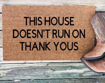 Funny Custom Doormat - 'This House Doesn't Run on Thank Yous' Welcome Mat - Personalized Non-Slip Entryway Rug for Front Door - Perfect Housewarming Gift for Homeowners & Funny Gift Idea