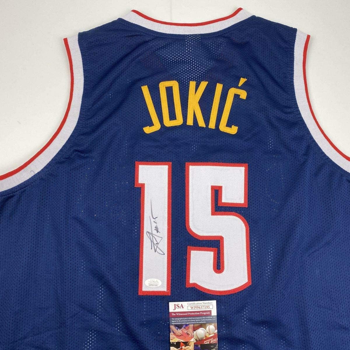Authentic Autographed Nikola Jokic Denver Nuggets Dark Blue Basketball Jersey with JSA COA - Perfect for Collectors, Fans, and Sports Memorabilia Displays