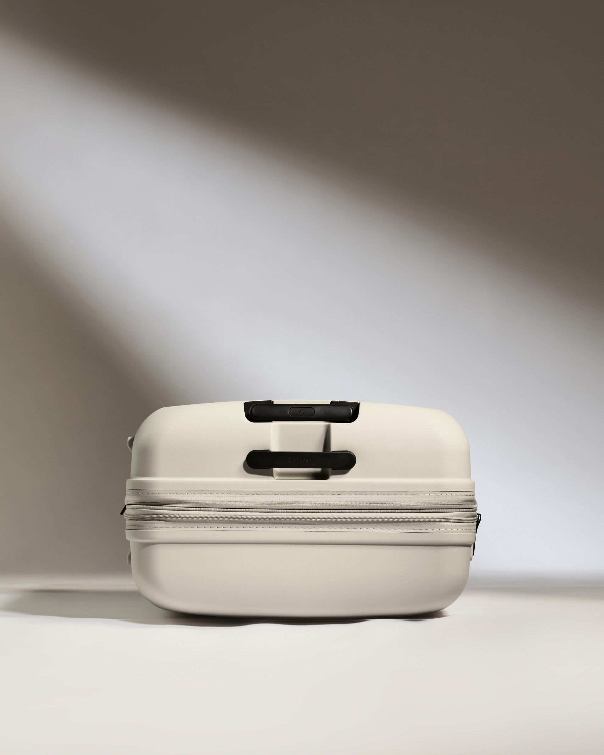 Large Taupe Luggage with Single Stripe - Spacious Travel Suitcase for Business Trips & Vacations