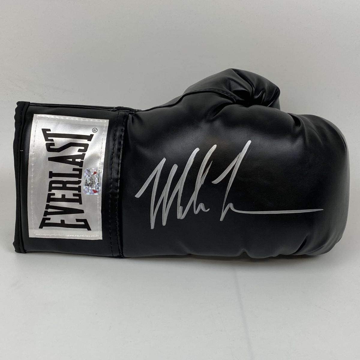 Authentic Autographed Mike Tyson Black Everlast Boxing Gloves with Hologram COA - Perfect for Boxing Memorabilia Collectors and Sports Fans Display