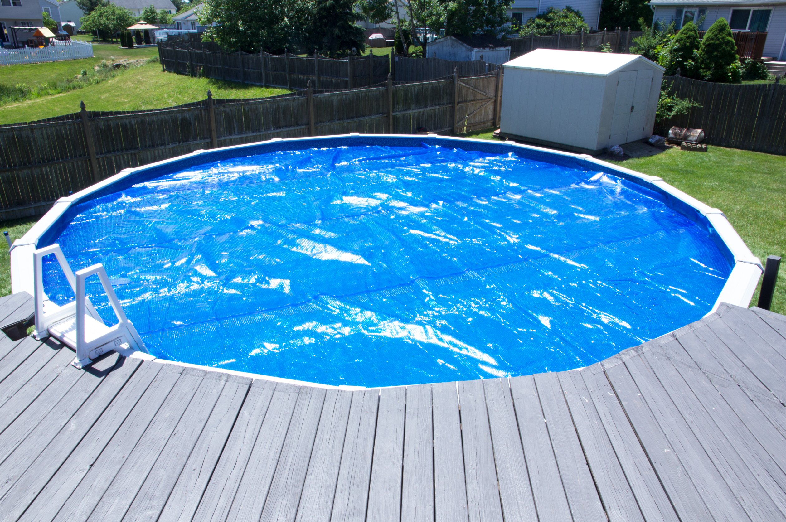 MidWest Canvas 27-Foot Round Solar Pool Cover | 12 Mil Thick Heating Blanket for Above Ground & Inground Pools | Bubble Side Down Installation | Energy Efficient Swimming Pool Accessory for Summer & Winter Use