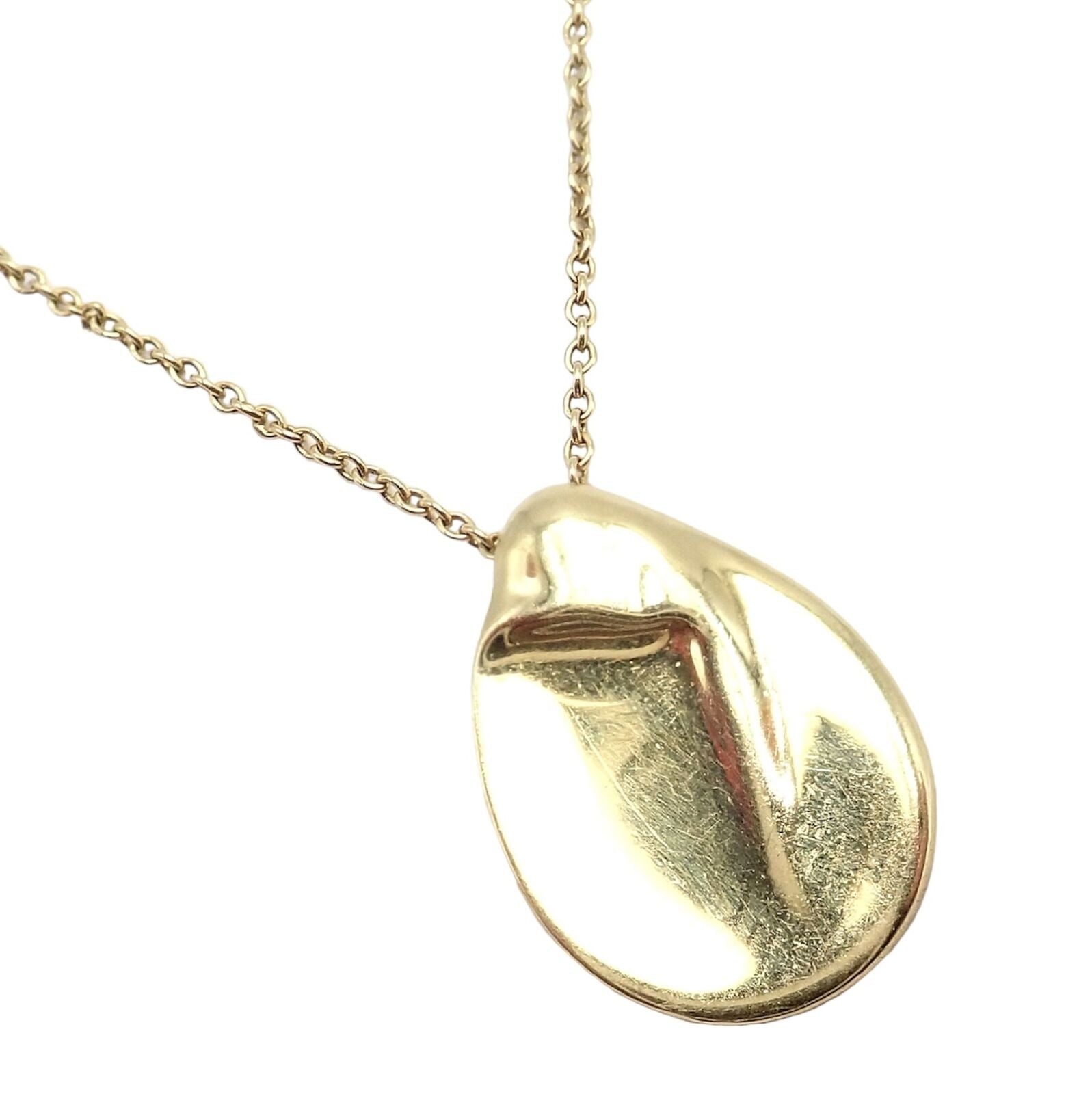 Tiffany & Co Peretti 18k Yellow Gold Madonna Pendant Necklace with Sweet Mini Chain - Elegant Jewelry Gift for Women, Perfect for Weddings, Anniversaries & Special Occasions