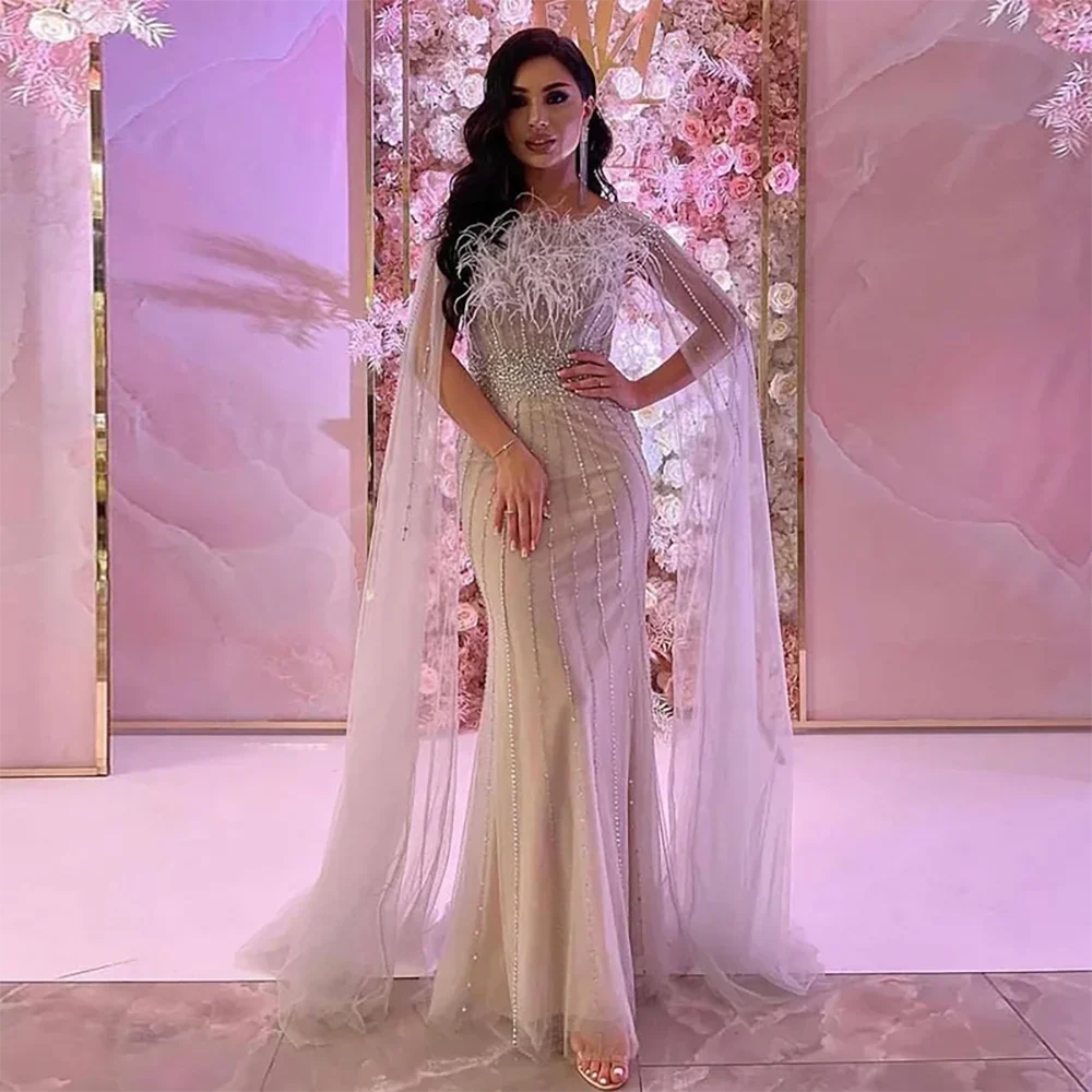 Elegant White Mermaid Evening Dress with Feather Cape & Beaded Details - Women's Formal Gown for Prom, Wedding, Red Carpet & Special Occasions