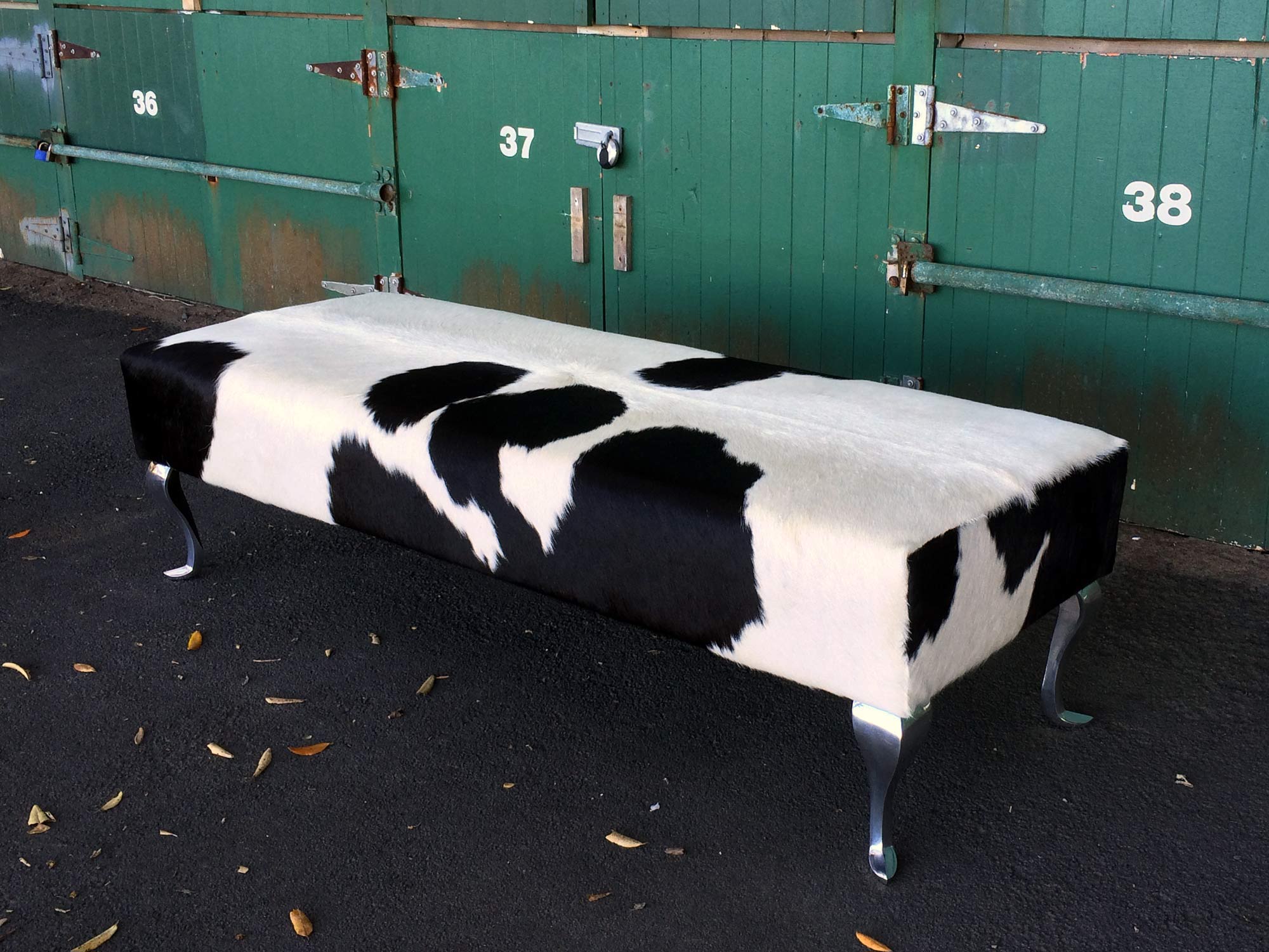 Premium Black and White Cowhide Ottoman with Queen Anne Legs - 63