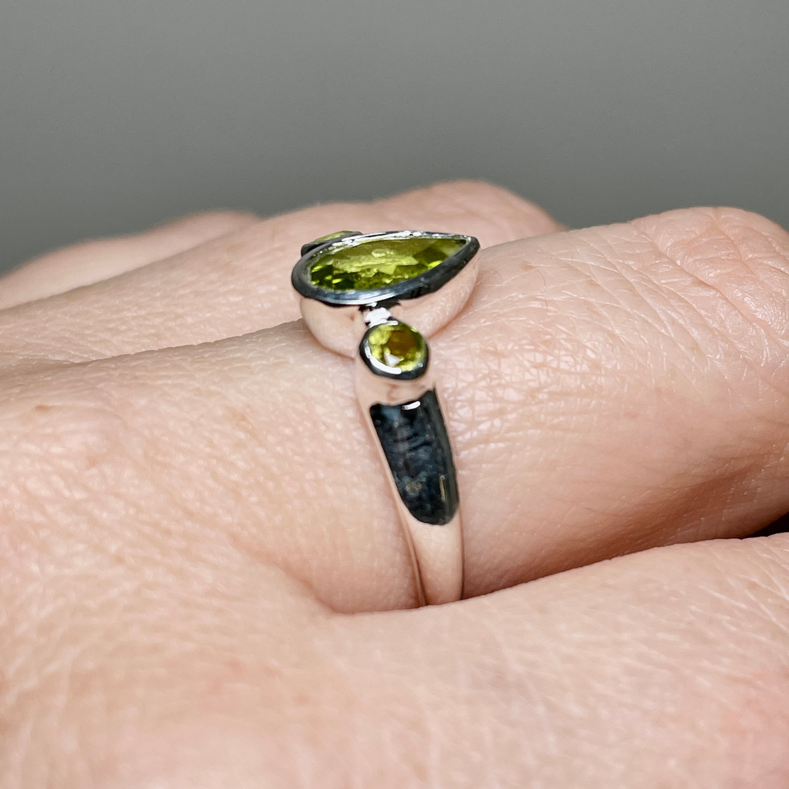 Peridot Faceted Gemstone Teardrop Ring with Accent Stones R3668 - Elegant Green Jewelry for Women, Perfect for Weddings, Parties & Special Occasions