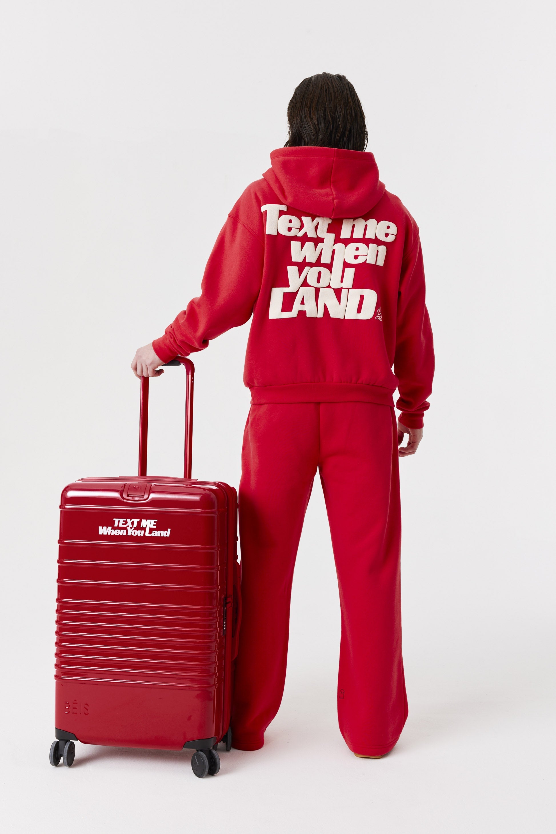 Textured Red Medium Check-In Roller Luggage - Perfect for Air Travel & Weekend Getaways