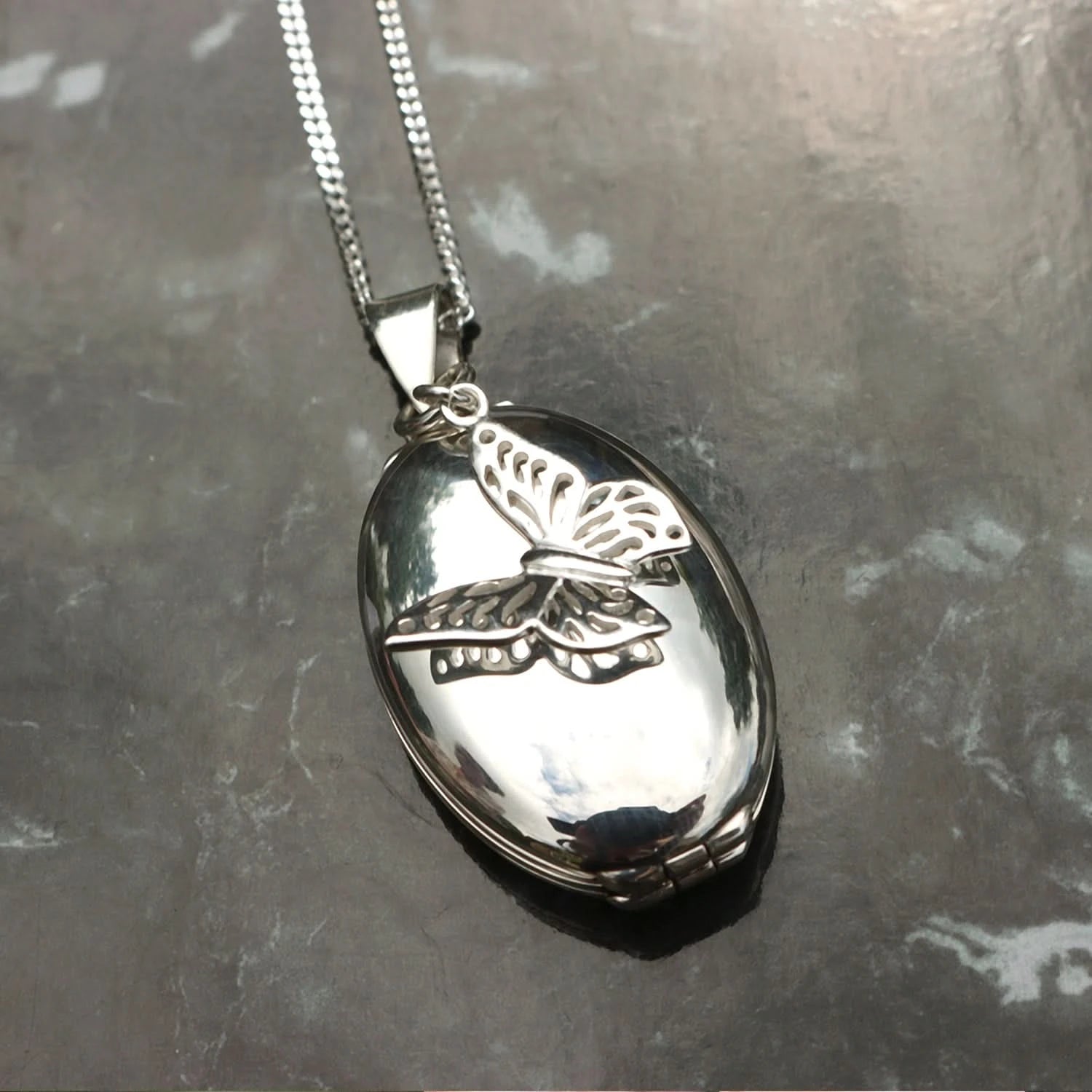 Four Photo Oval Butterfly Locket Necklace in Sterling Silver - Perfect for Valentine's Day Gifts, Anniversary Presents & Keepsake Jewelry