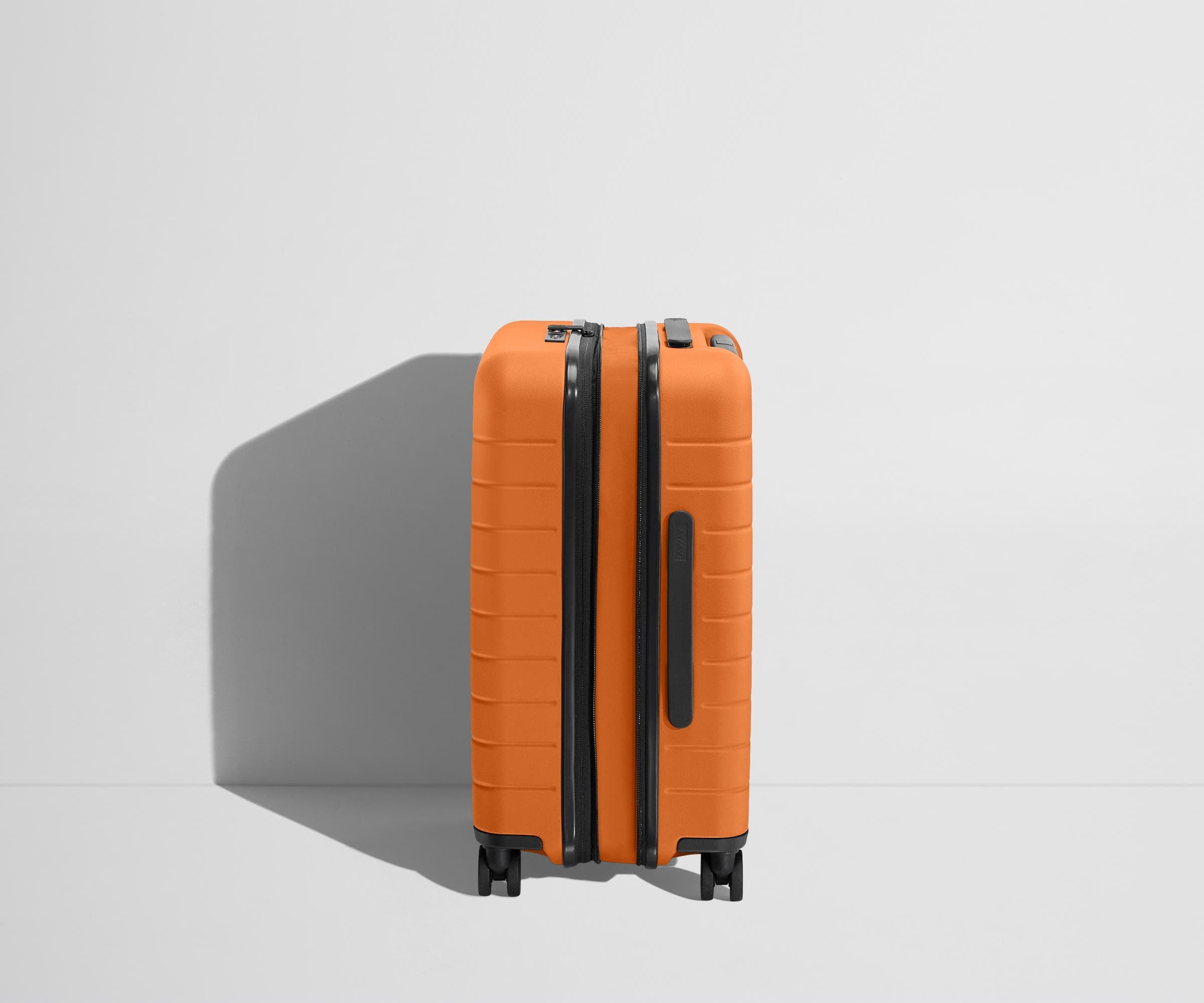 The Carry On Flex in Sorbet Orange - Lightweight Expandable Suitcase for Travel, Business & Weekend Getaways | Perfect for Airplane Cabin & Road Trips