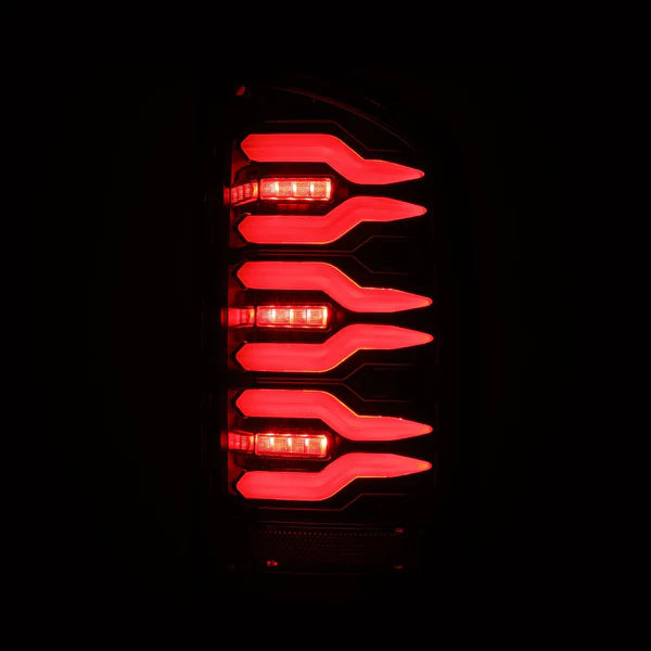 02-06 Dodge Ram 1500 & 03-06 Dodge Ram 2500/3500 LED Tail Lights - LUXX Series Alpha Black - Upgrade Your Truck's Style & Visibility for Night Driving & Off-Road Adventures