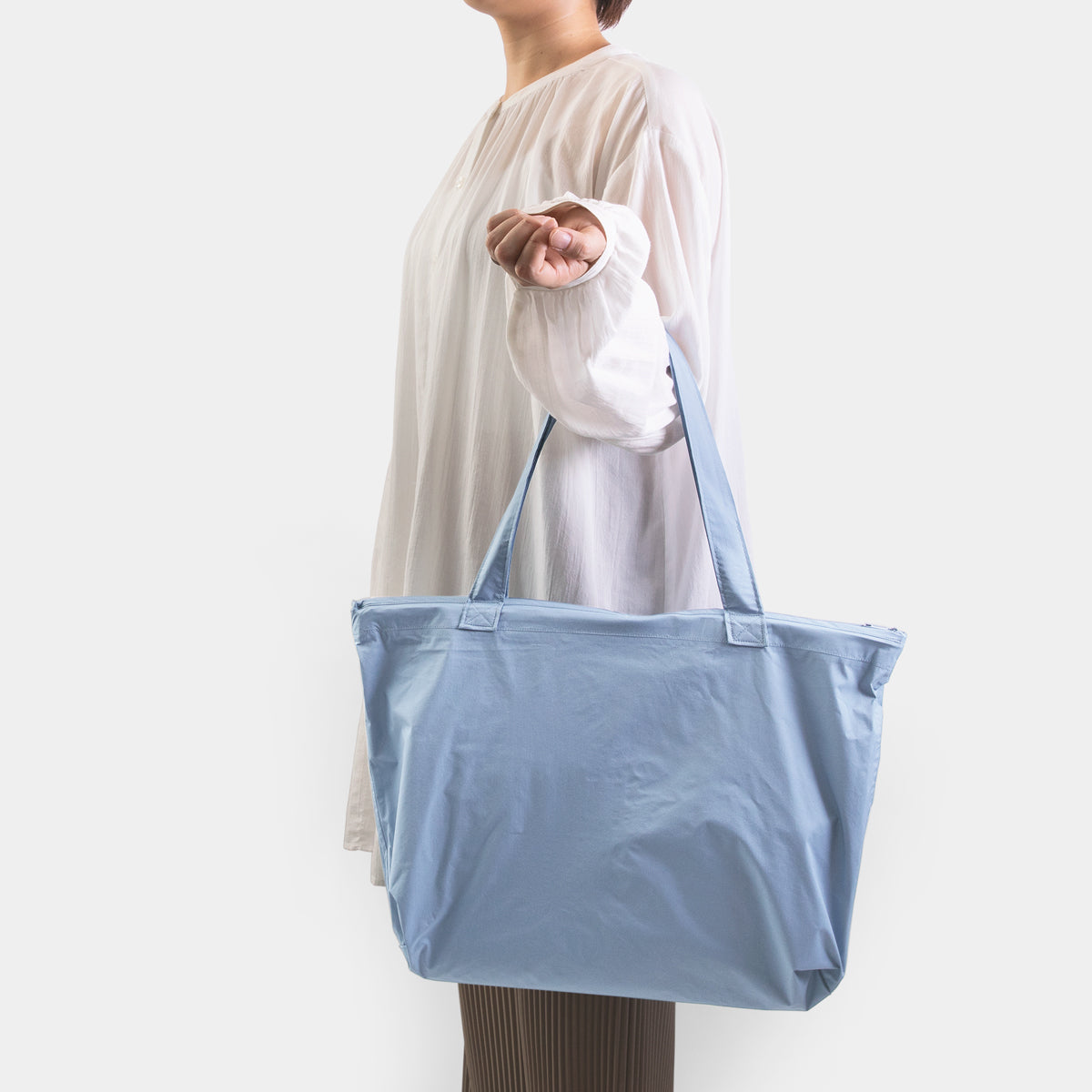 TRAVELER'S COMPANY Traveler's Factory x TO&FRO Waterproof Rain Bag - Blue Gray | Compact Travel Accessory for Outdoor Adventures & Commuting