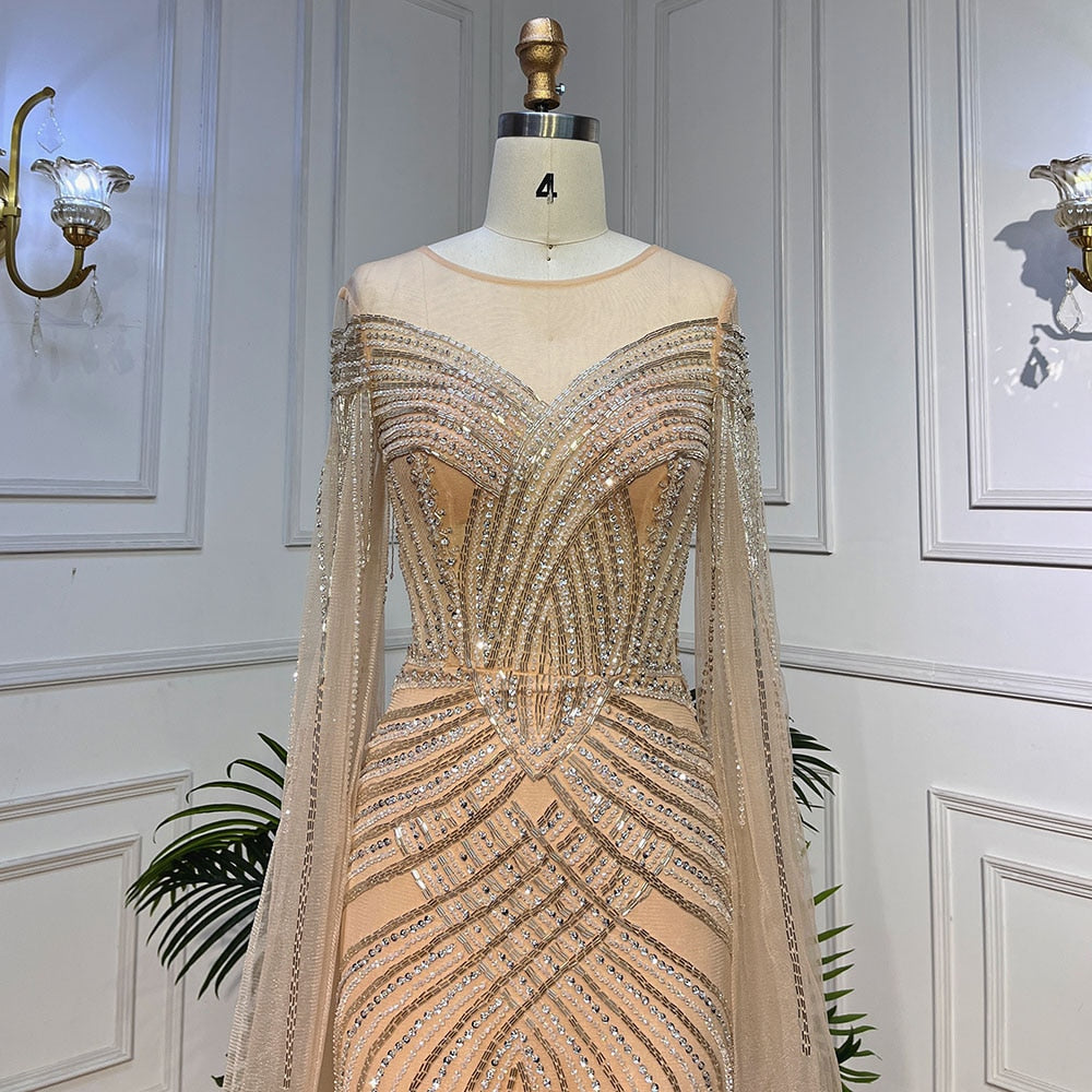 Elegant Beaded Mermaid Evening Gown with Cape Sleeves - Arabic Inspired Nude Luxury Dress for Women 2025 | Perfect for Weddings, Galas & Formal Parties