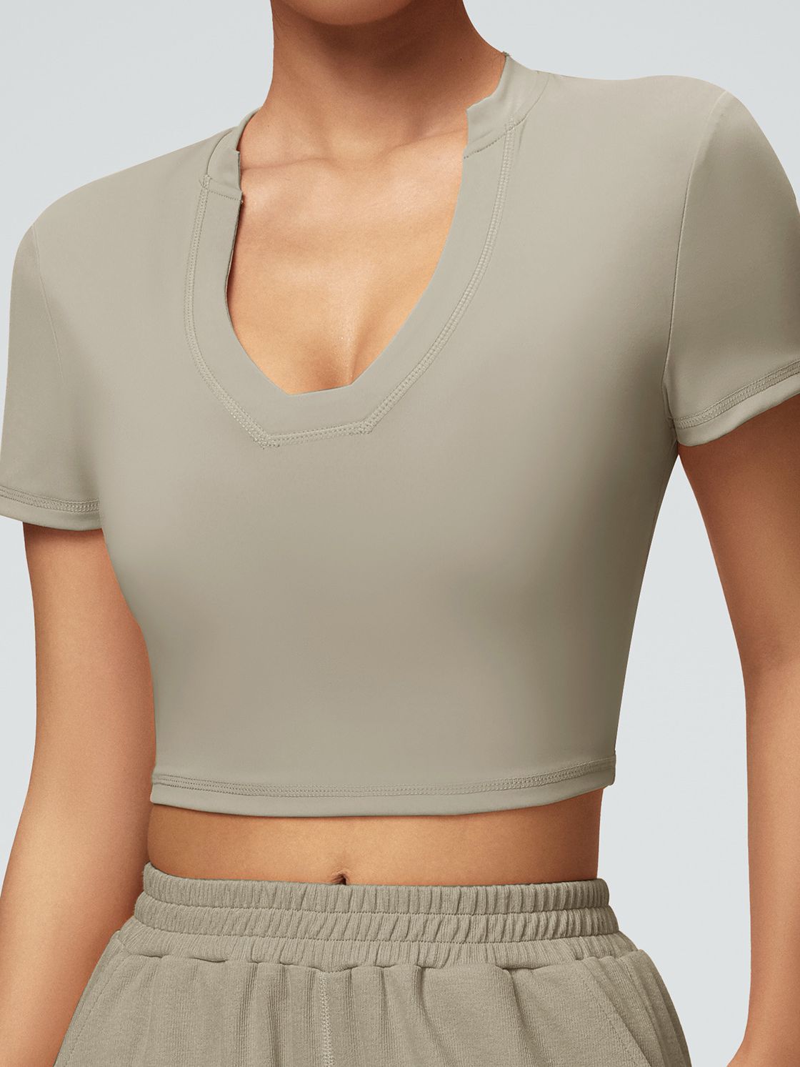 ZASUWA Women's Solid Color V-Neck Quick Dry Stretchy Tight Short Sleeve T-Shirt - Perfect for Yoga, Gym & Casual Wear