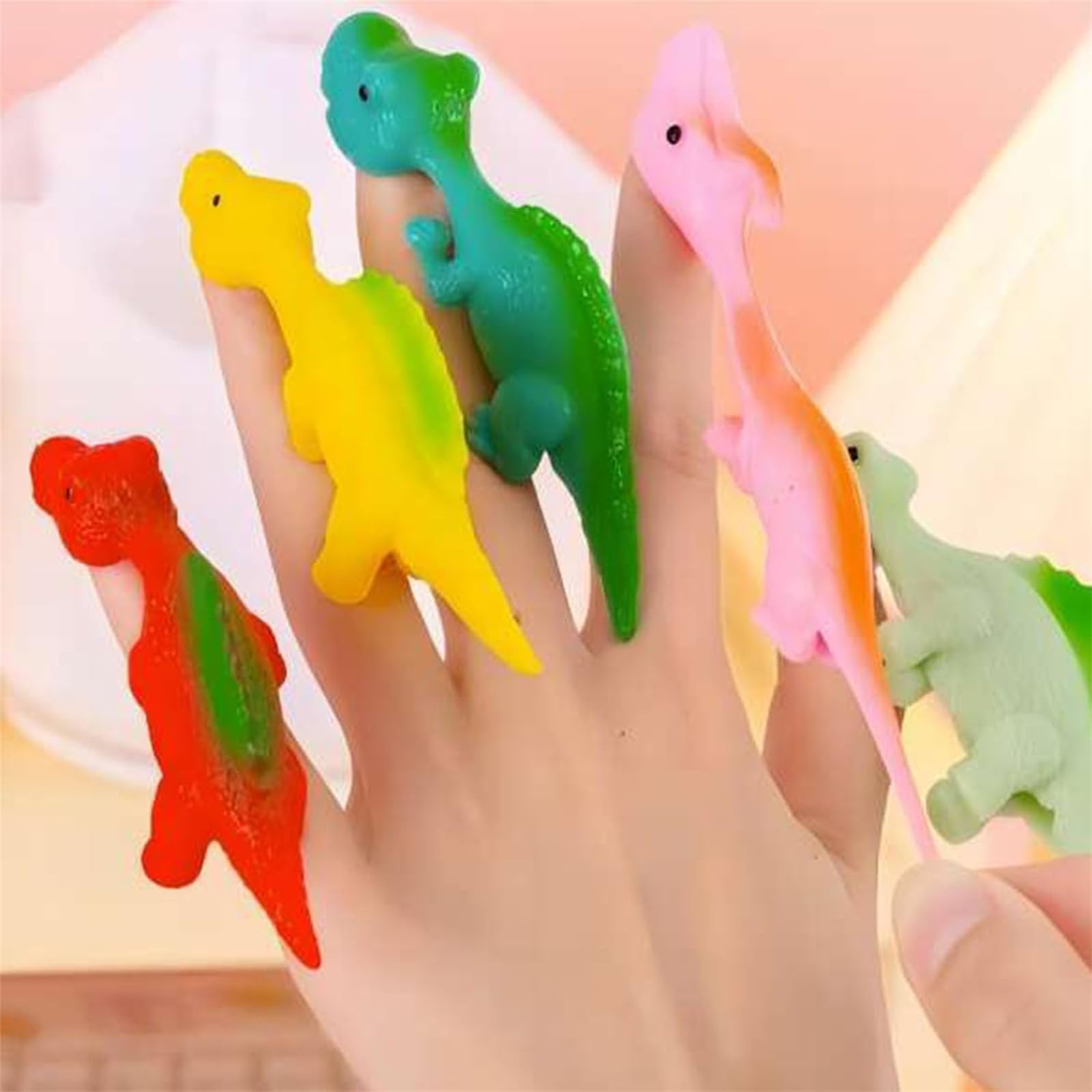 Stretchy Flying Dinosaur Finger Toys - 10PCS Sticky Slingshot Dino Toys for Kids, Fun Stretchable Dinosaur Catapult Game - Perfect for Outdoor Play, Birthday Parties & Stress Relief