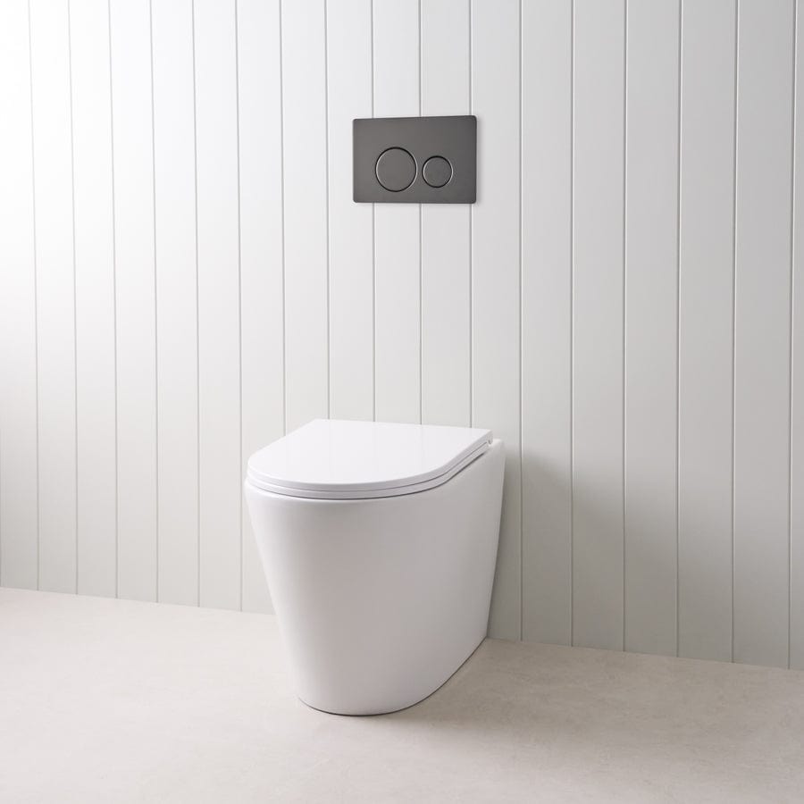 Angled In-Wall Toilet with Round Matte Black Buttons - Modern Space-Saving Bathroom Solution for Small Spaces & Contemporary Homes