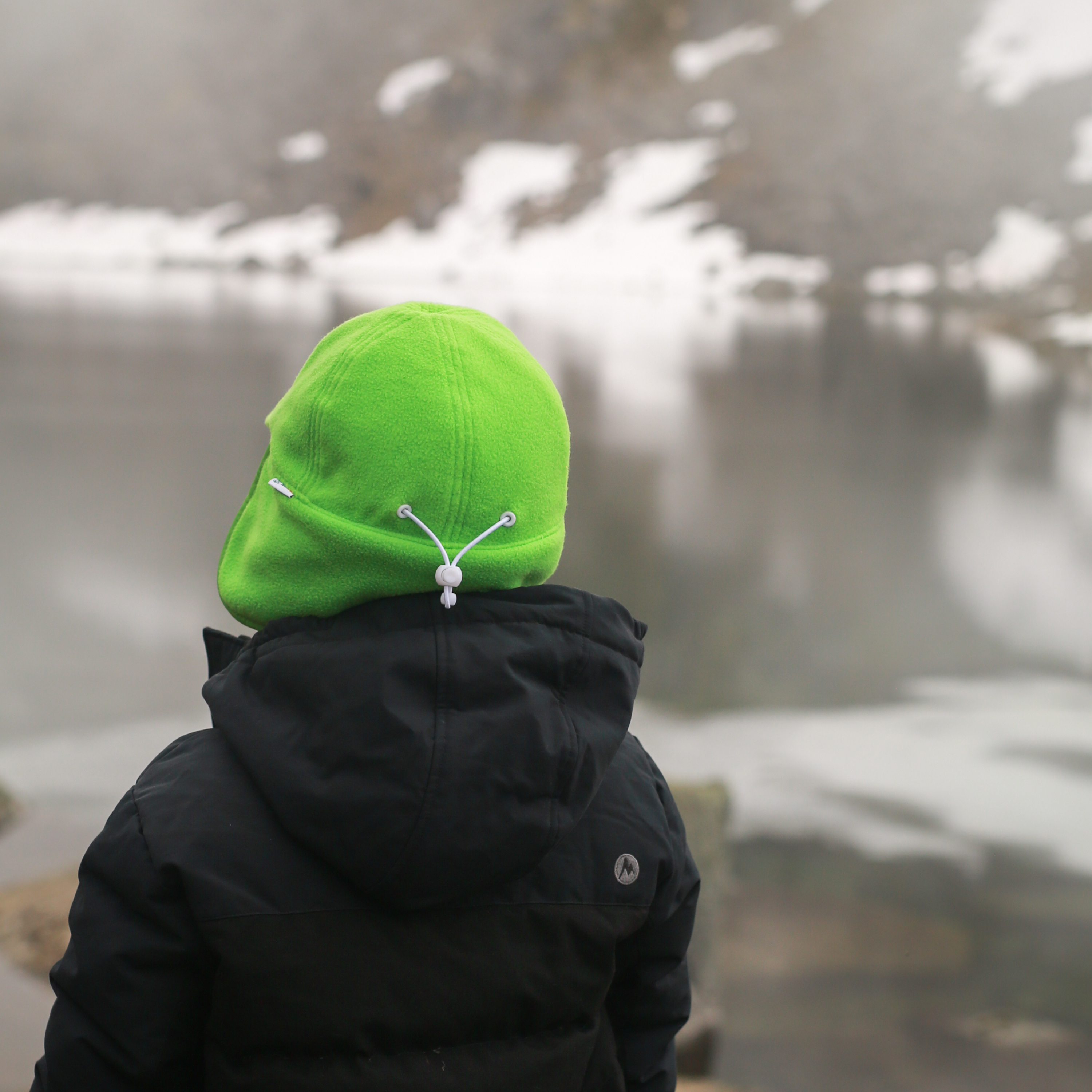 Kids Frosty Fleece Winter Flap Hat with Ear Flaps - Warm Evergreen Beanie for Boys & Girls - Perfect for Snow Play, Skiing, and Cold Weather Activities