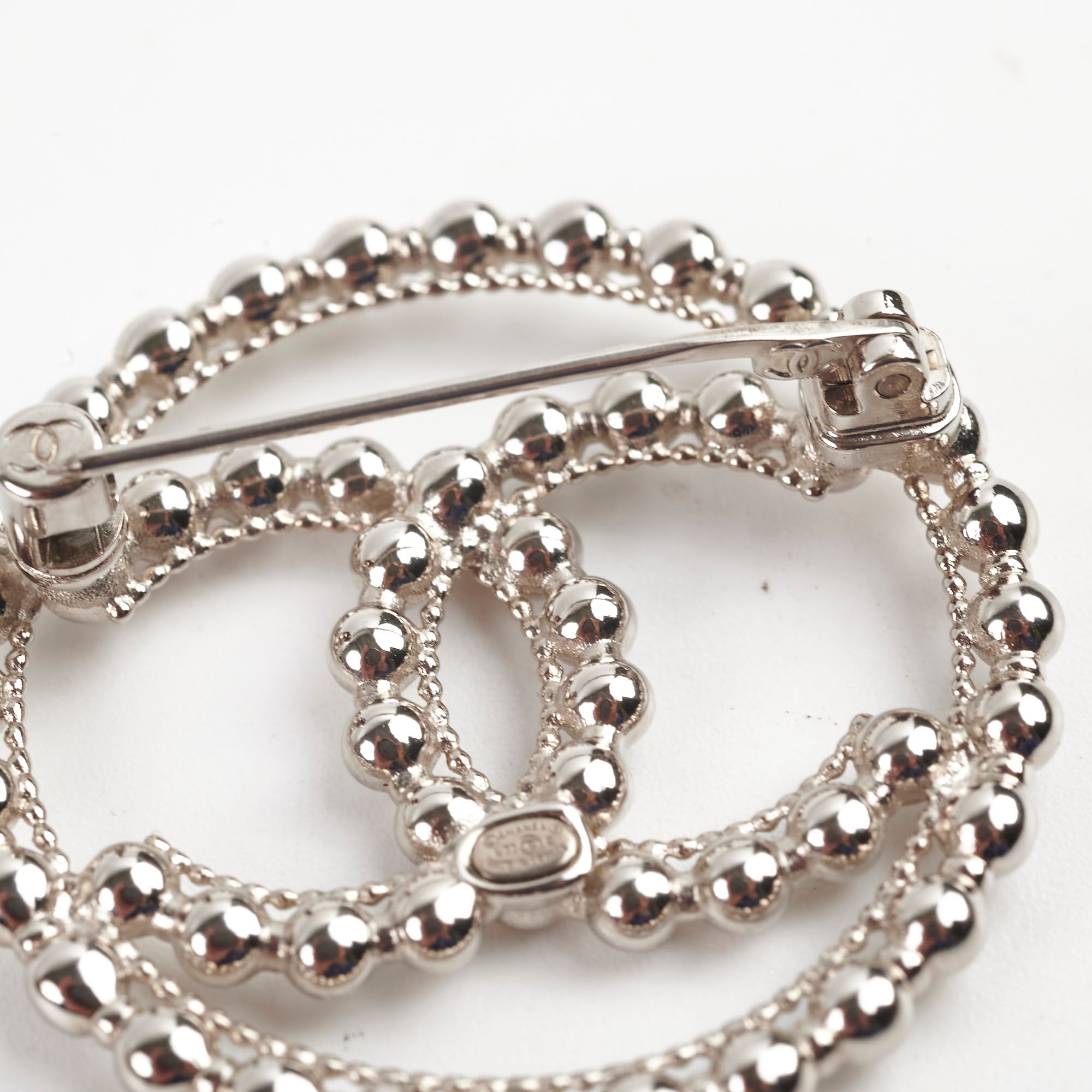Chanel CC Round Silver Brooch - Elegant Vintage Fashion Pin for Women | Perfect for Jackets, Scarves, Bags & Special Occasions