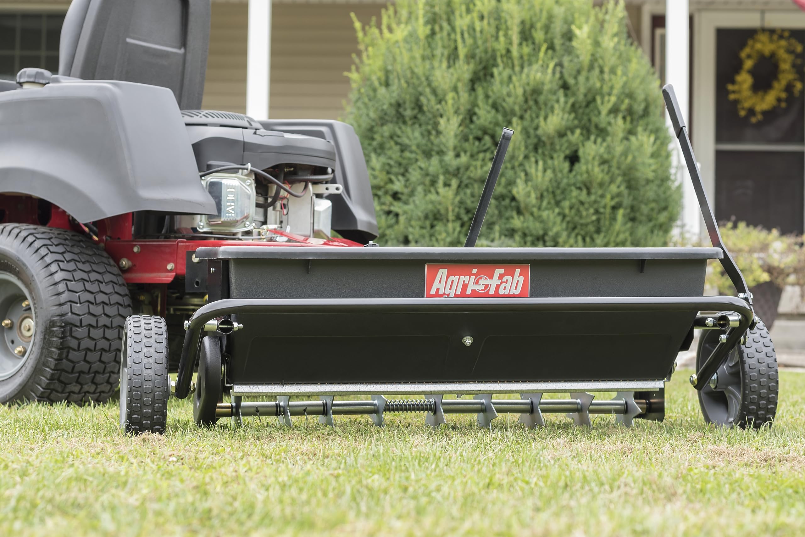 Agri-Fab 45-0543-AMZ 100 lb. Tow-Behind Lawn Spiker Seeder Drop Spreader - for Seed, Fertilizer, Salt & Ice Melt - Compatible with Lawn & Garden Tractors - Perfect for Lawn Care, Yard Maintenance & Winter De-Icing