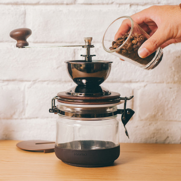 Hario Canister Coffee Grinder - Manual Ceramic Burr Mill for Fresh Ground Coffee - Perfect for Home, Office, and Travel Use